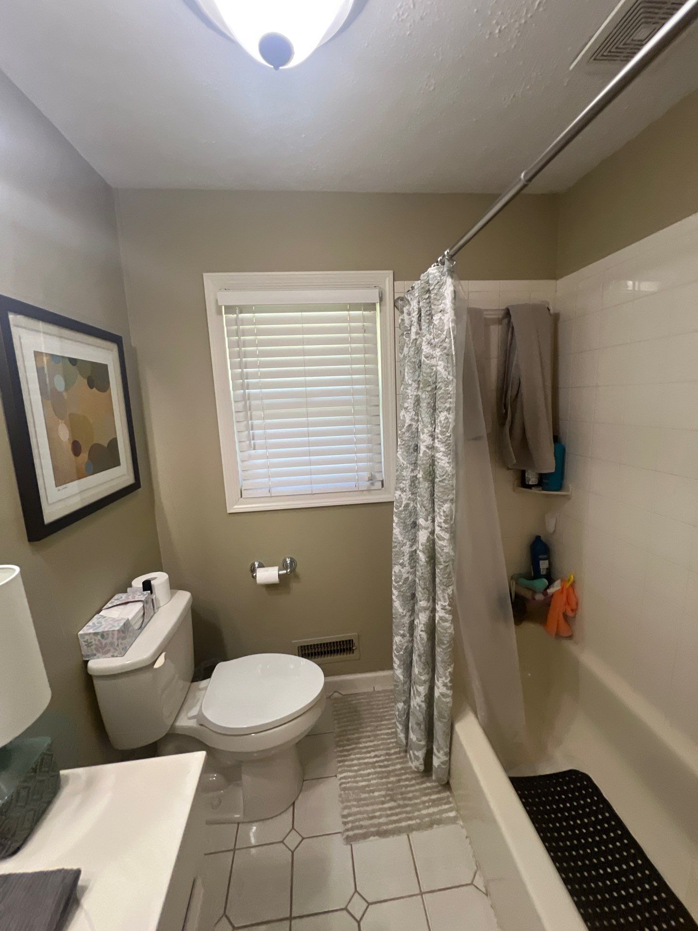 Full bathroom with custom tile by The Shower Company