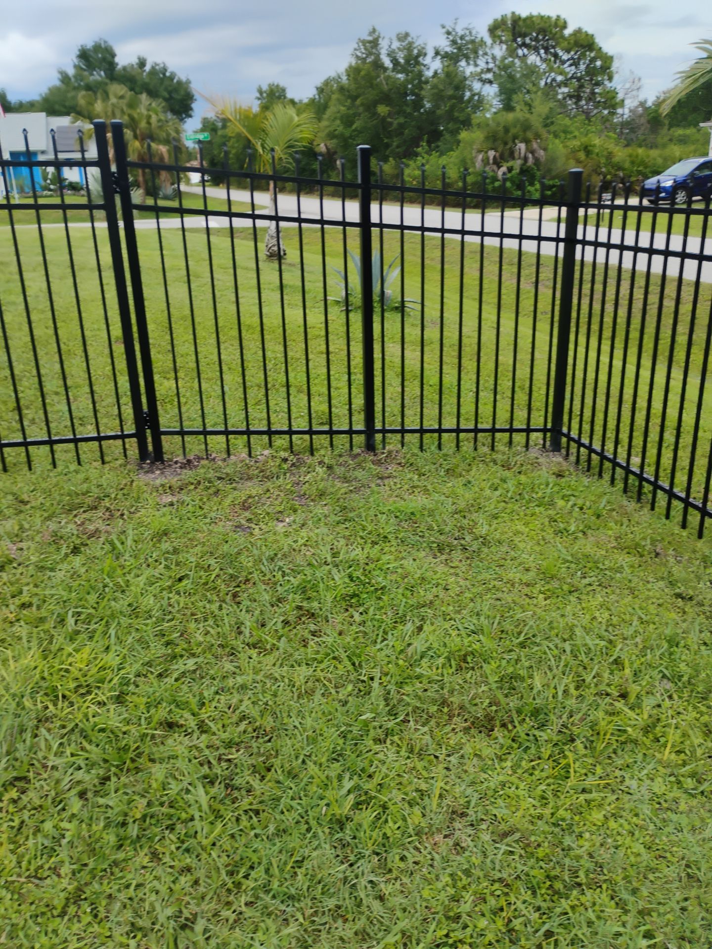 Black Aluminum Spear Top Picket Fence Installation in Englewood by True Fence LLC