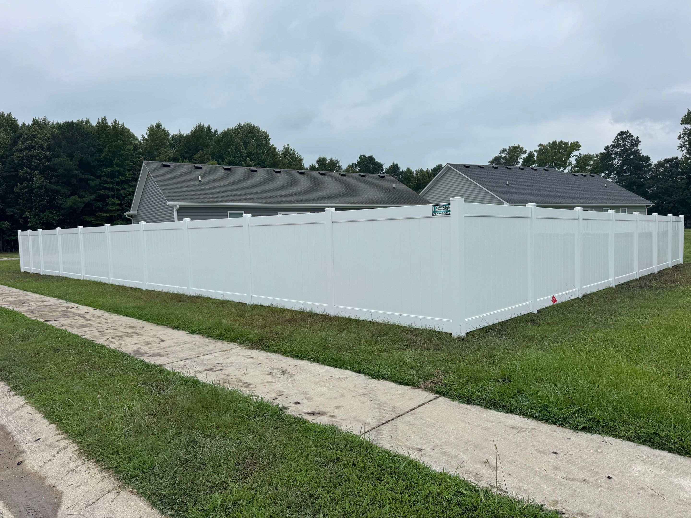 Modern Durability in Vinyl by Tidewater Fence