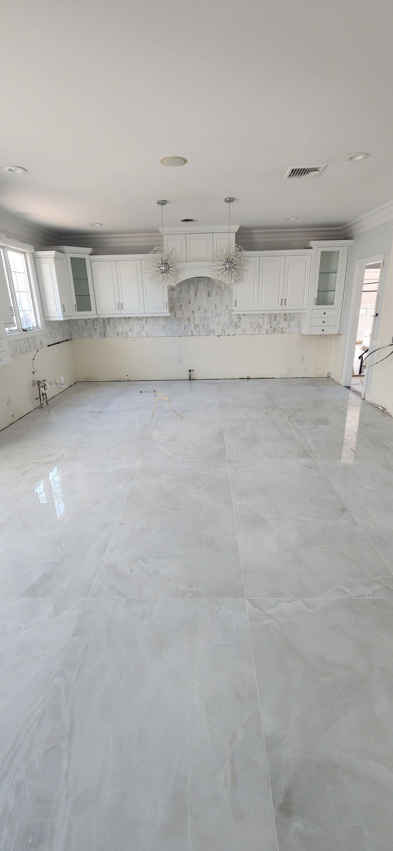 Large Format Tile Installation by Footprints Floors Morristown