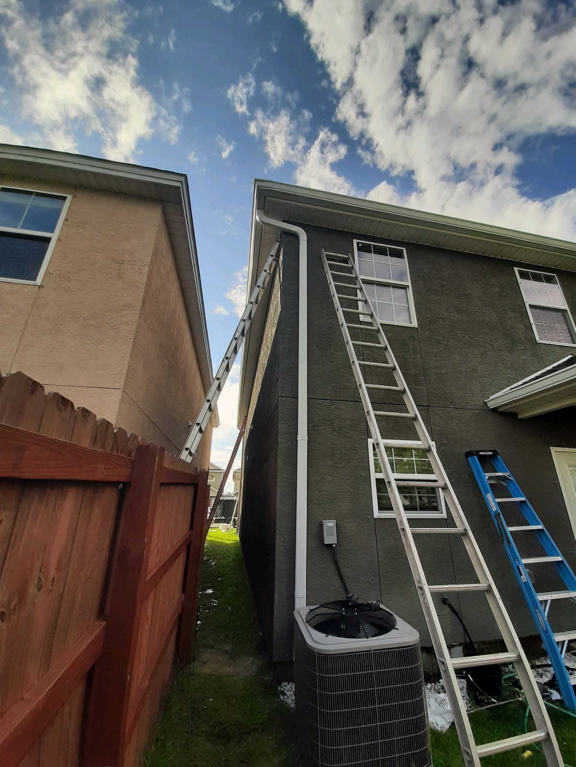 Seamless Gutter Installation using White K-Style Gutters by Gutter Professors