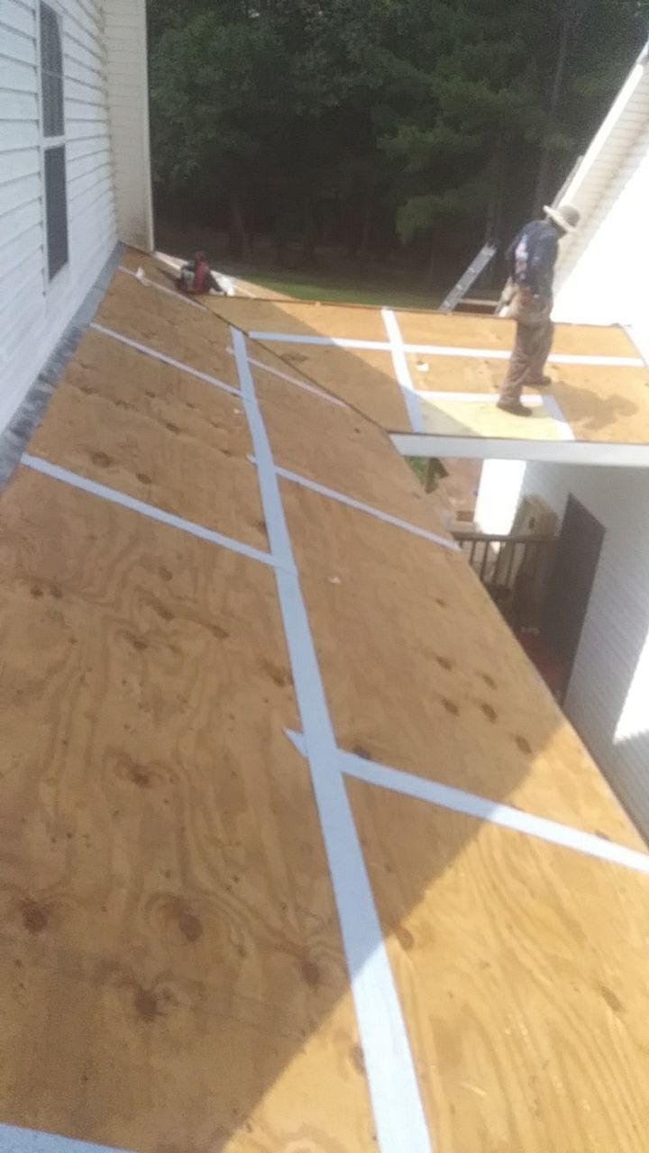 Residential Roofing Installation using Roof Replacement by American Roofing & Construction LLC