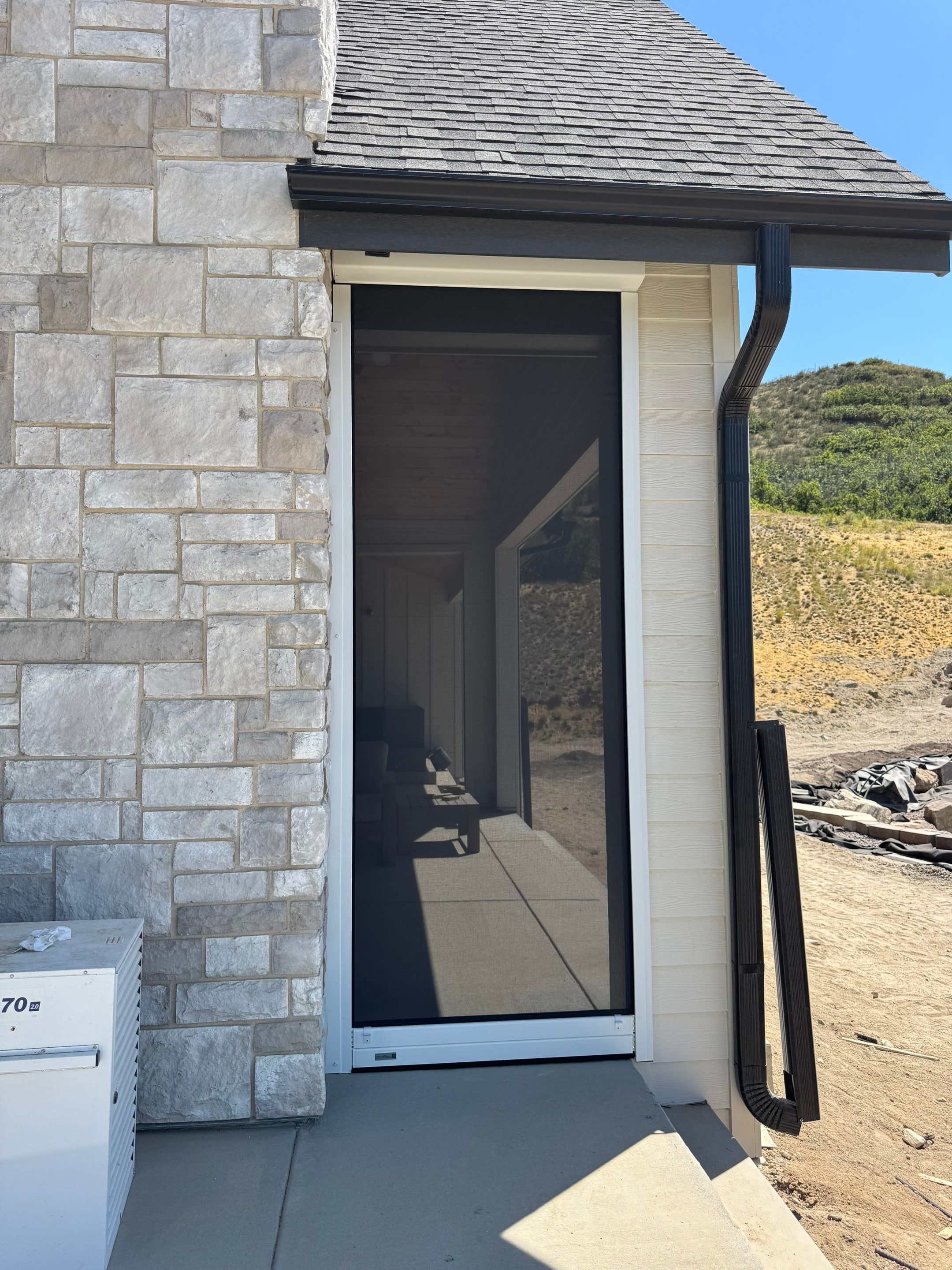 Custom Exterior MagnaTrack Screens for Modern Farmhouse Patio in Castle Rock by Outdoor Solutions Colorado