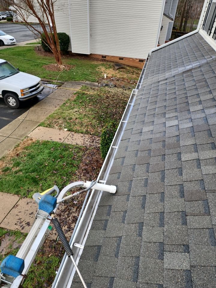 Gutter Cleaning using water by Power Wash Masters LLC