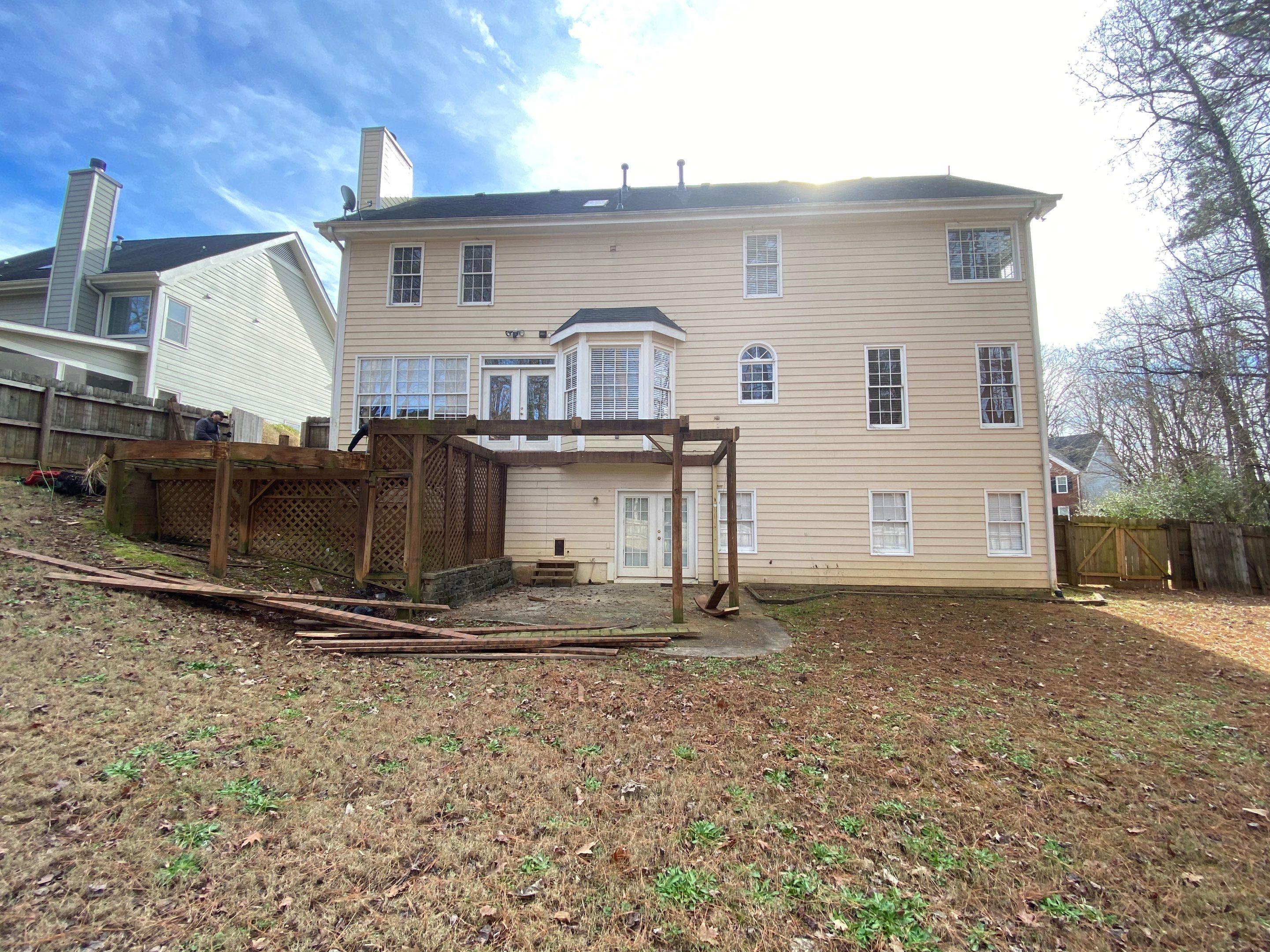 Elevated Pressure-Treated Wood Deck Replacement and Staircase in Duluth by Swift Home Renovations