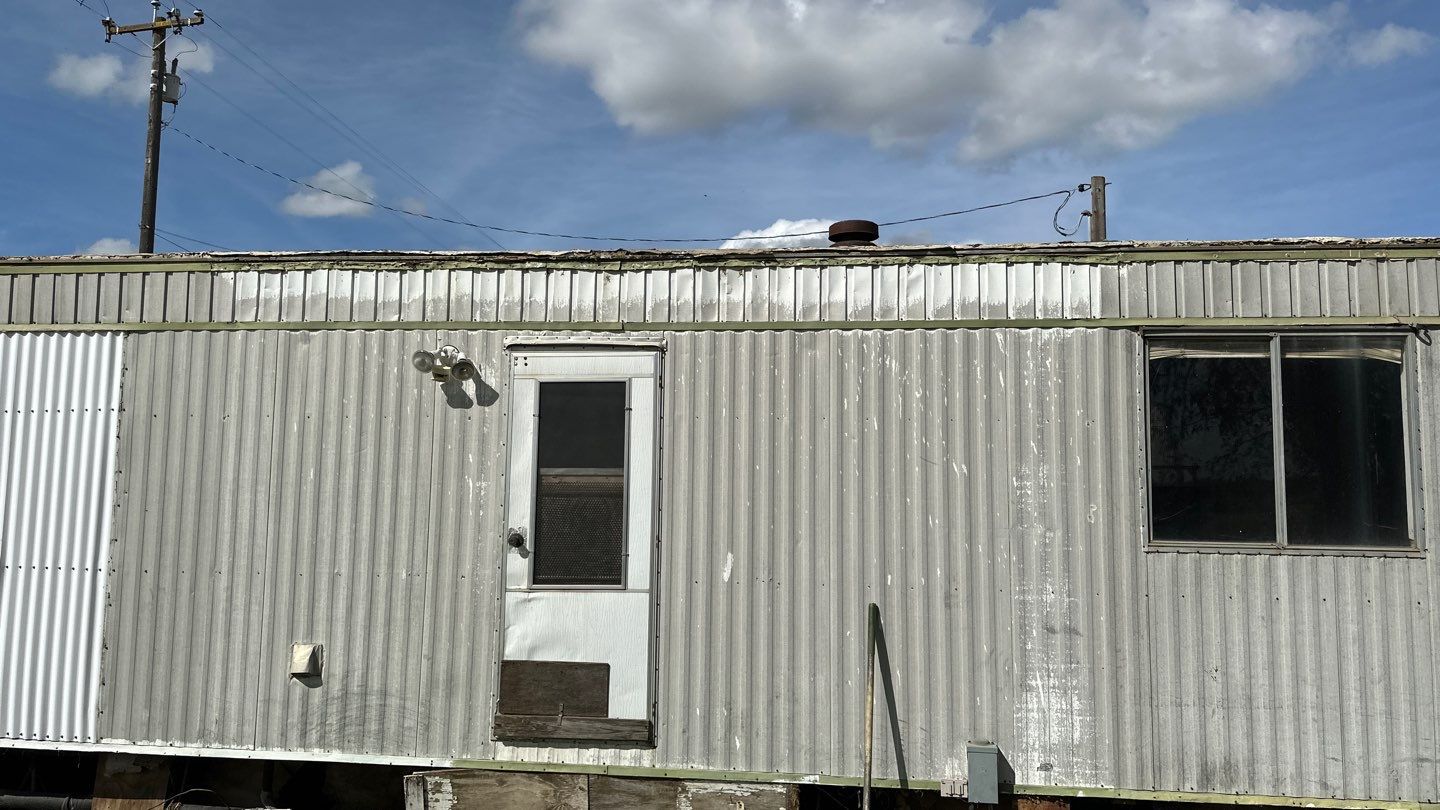 Foam and coatings on mobile home by Straight Edge Roofing Inc