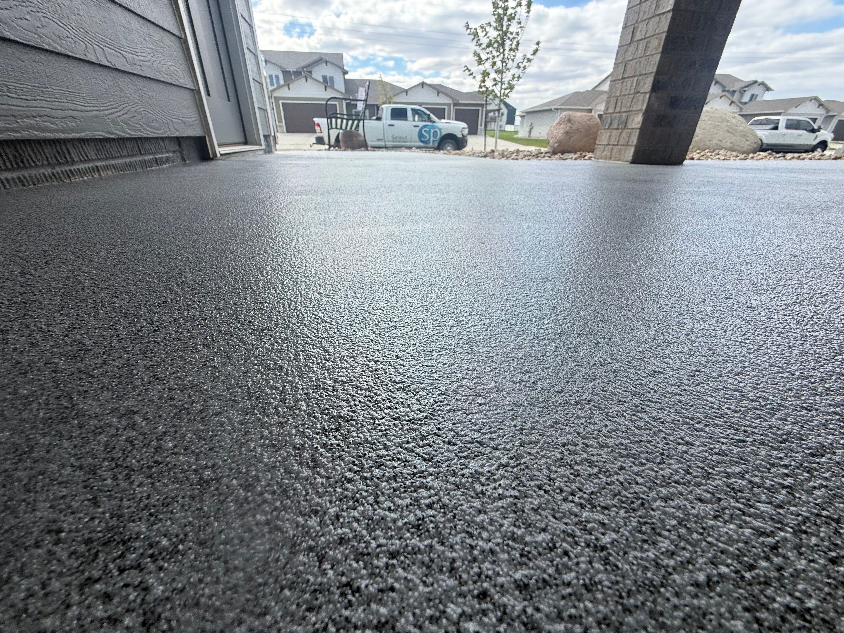 Decorative Flake Concrete Coating for Sioux Falls Porch and Patio by Select Painting, Coatings & Garage Cabinets