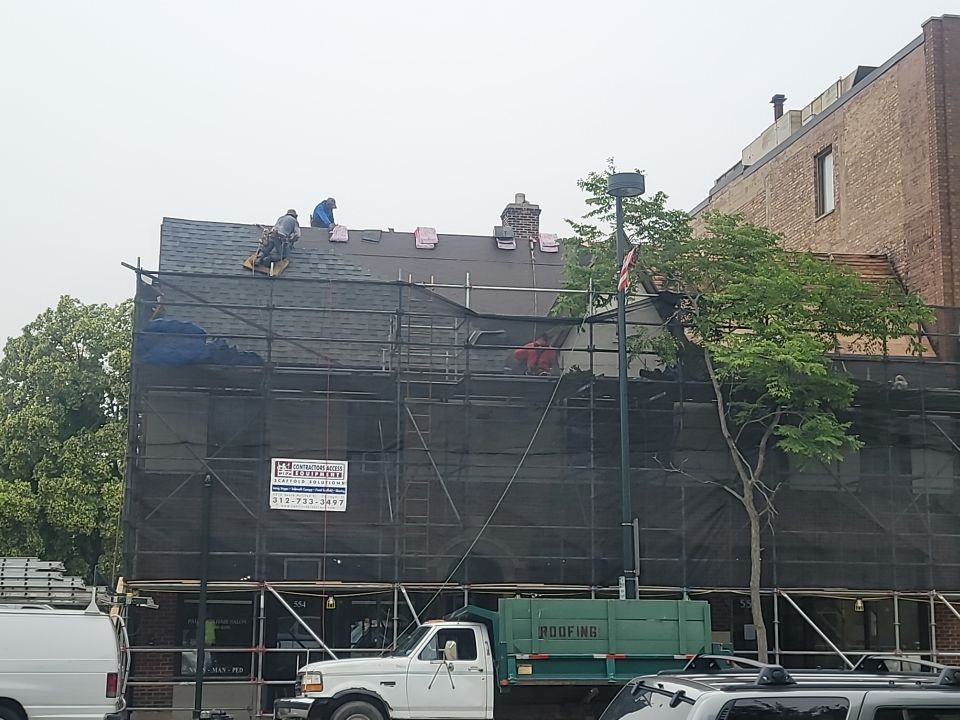 Asphalt Roof Replacement with Aluminum Gutter Installation by Custom Installations