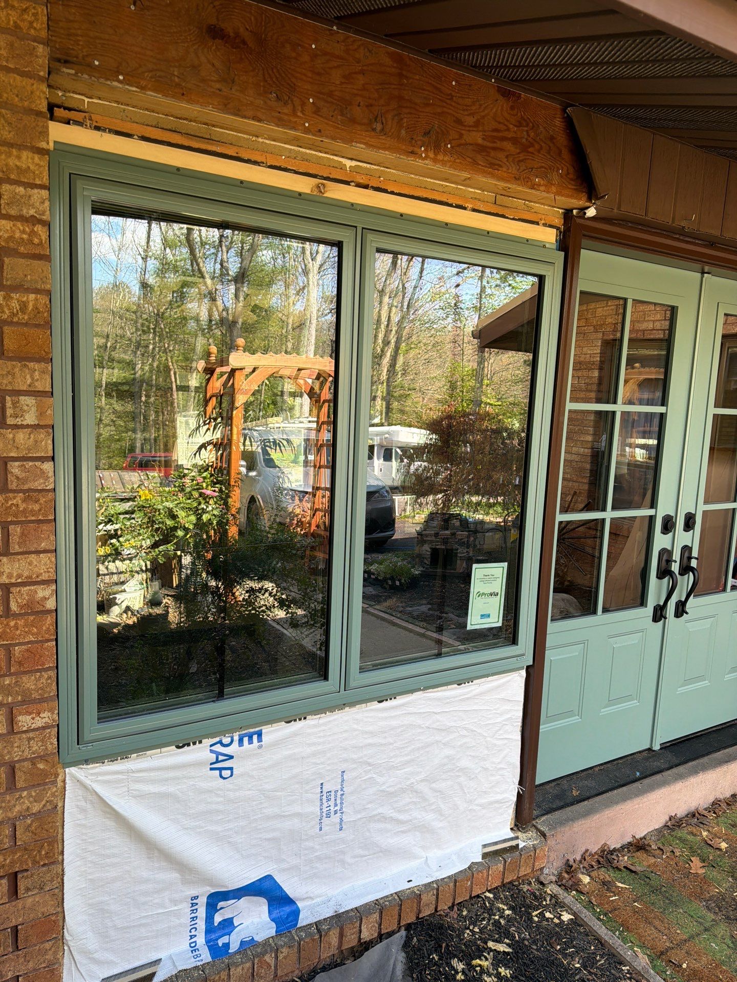 Sage Green Entry Door Replacement and Window Installation in Lykens by Esh Builders