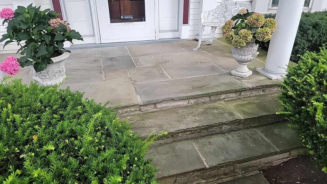 Housewashing  using Algaecide, soft wash soap by Northern Power Washing LLC.