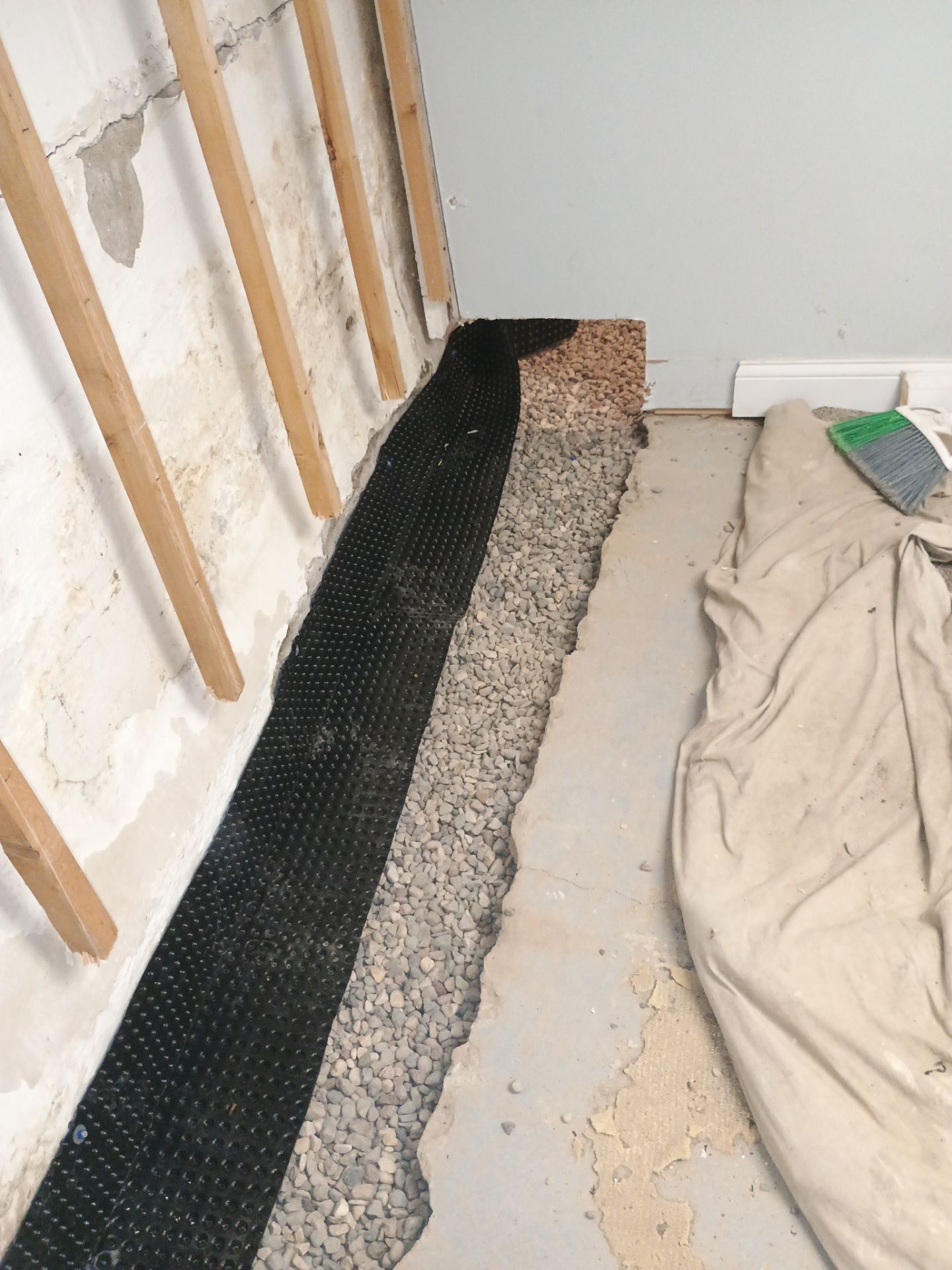 Interior Drain Tile Installation in South Minneapolis by Waterproofing Northeast