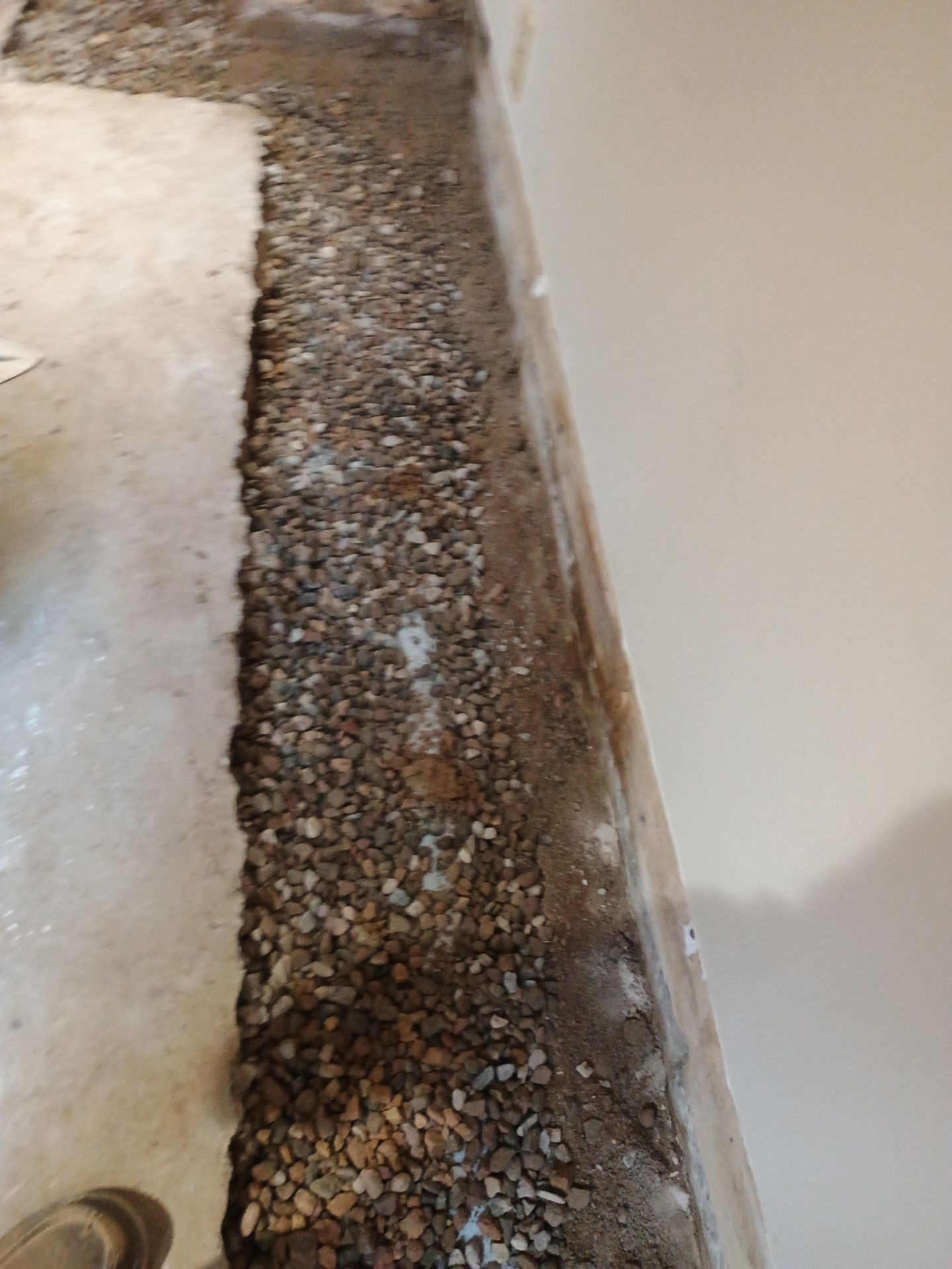 Completing the Connection for Lisa's Drain Tile System by Waterproofing Northeast