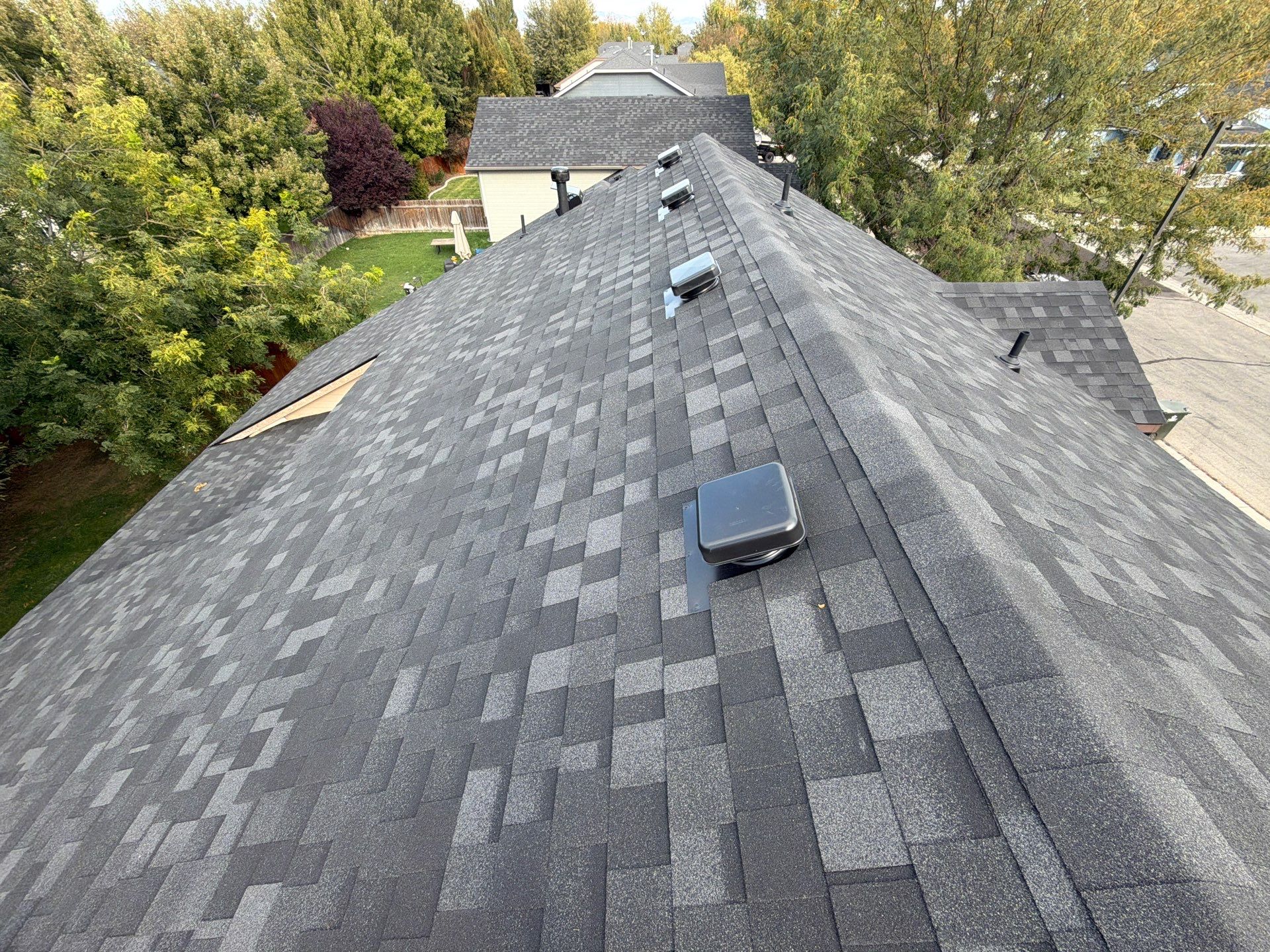 Residential Roof Replacement in Meridian Featuring Charcoal Architectural Shingles by Olive Roofing