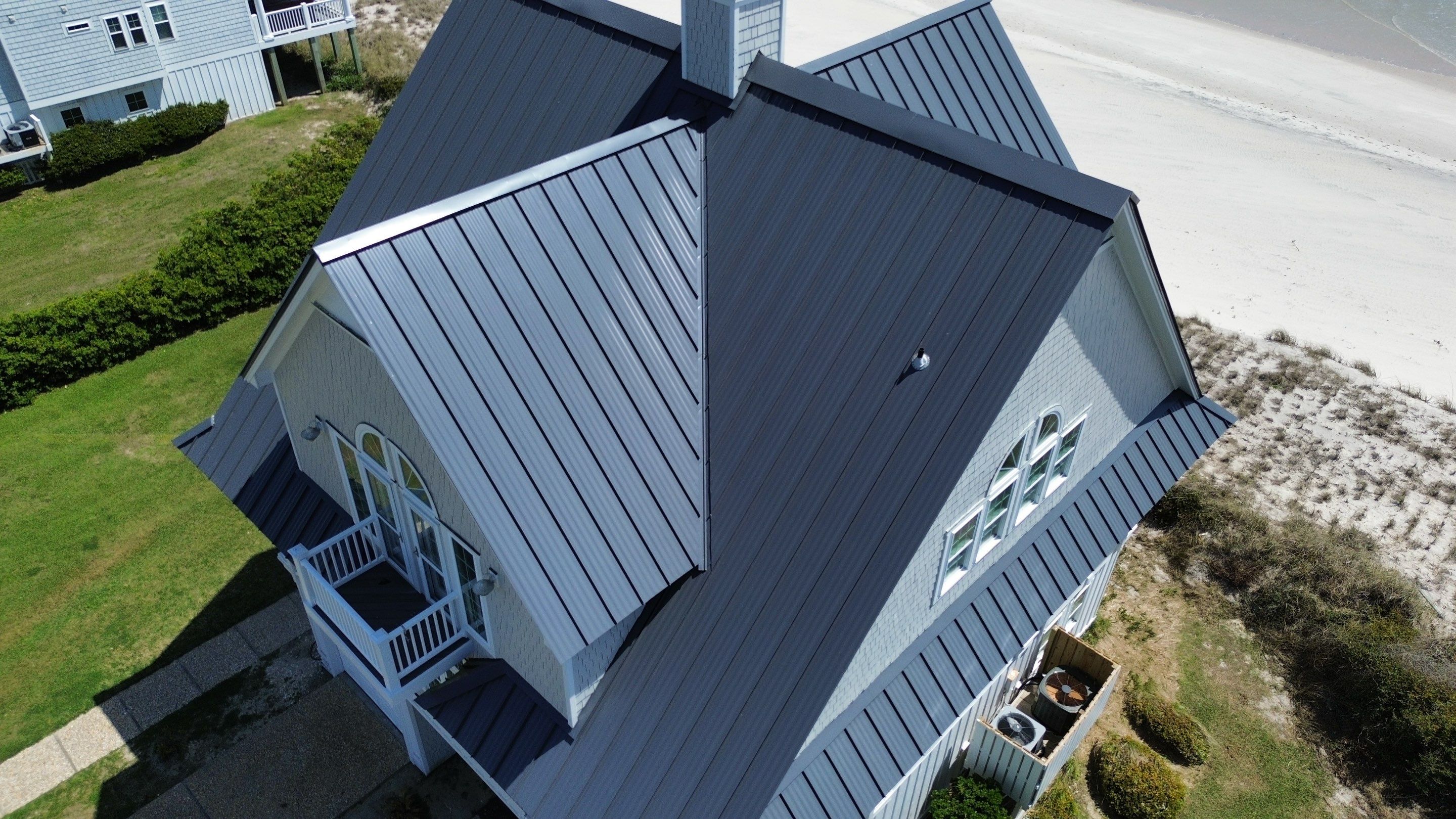 Standing Seam Metal Roof Replacement- North Topsail Beach, NC by Summit Roofing 