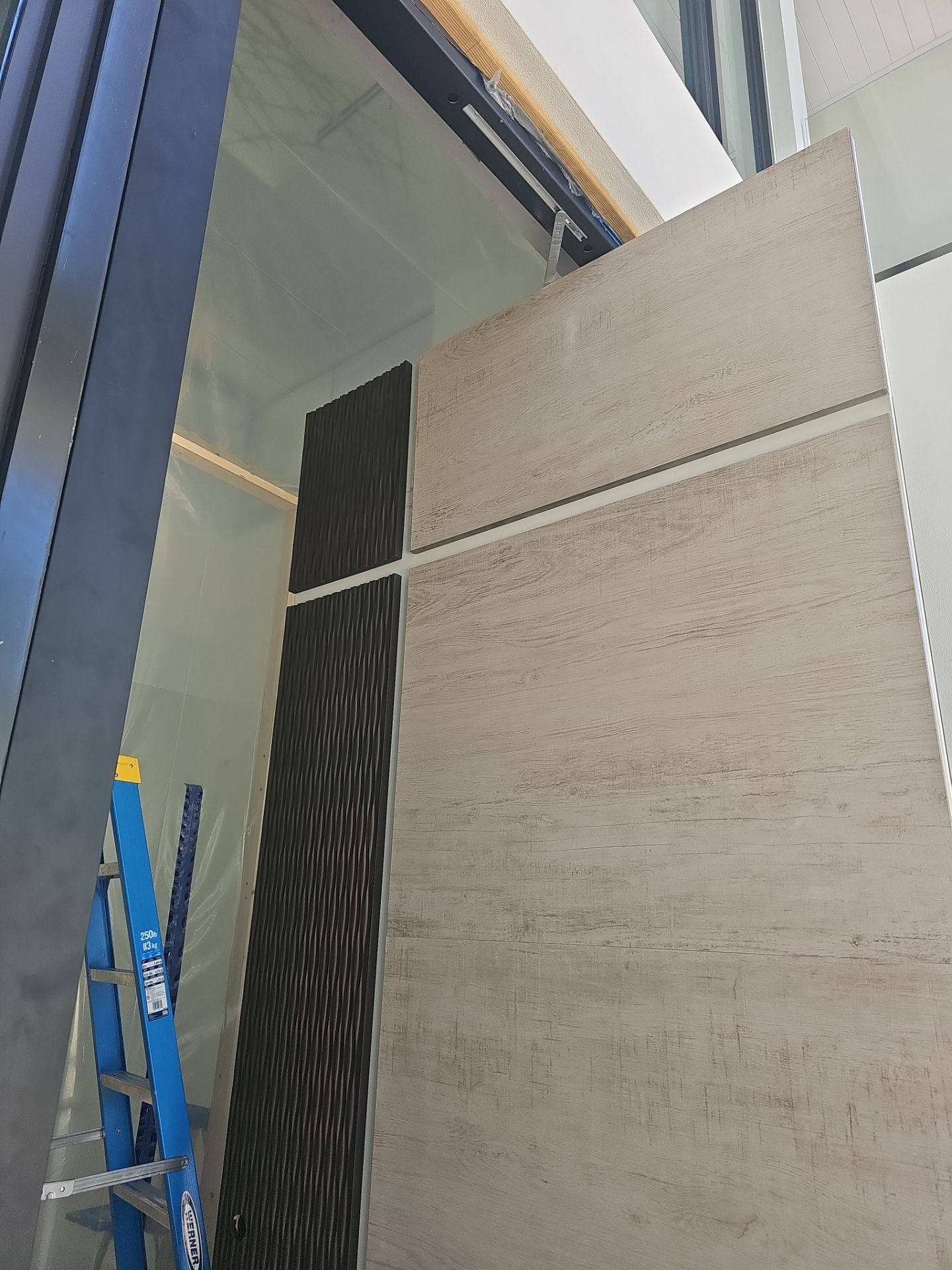 This stunning custom pivot door is a true statement of security and luxury, installed in the heart of Boca Raton. Designed to withstand the harshest conditions, it is hurricane-certified, ensuring unparalleled strength and protection. The door features a bespoke metal finish, exuding modern elegance while complementing the surrounding architecture. A custom metal door handle enhances its unique aesthetic, blending seamlessly with the door’s bold presence. Beyond its striking appearance, this door is equipped with advanced security technology, including a motorized lock for effortless access control and a self-closing feature for seamless functionality. A masterpiece of craftsmanship and innovation, this installation embodies the perfect fusion of security, design, and cutting-edge automation—a true reflection of FBS’s commitment to excellence. by FBS Systems Inc