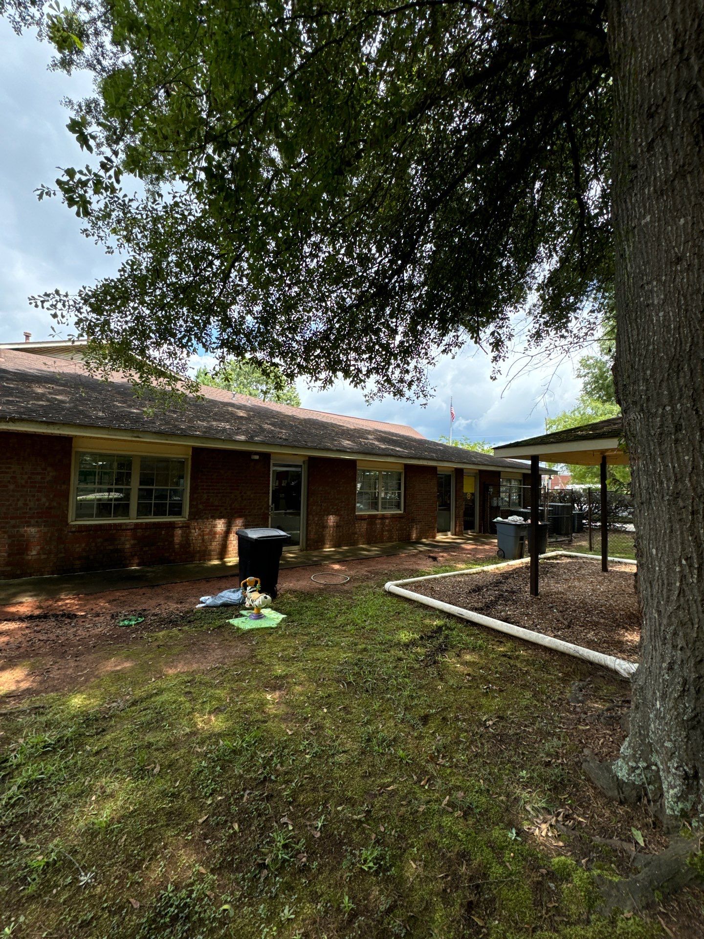 Commercial Exterior Brick and Stucco Painting in Fayetteville by Swift Home Renovations