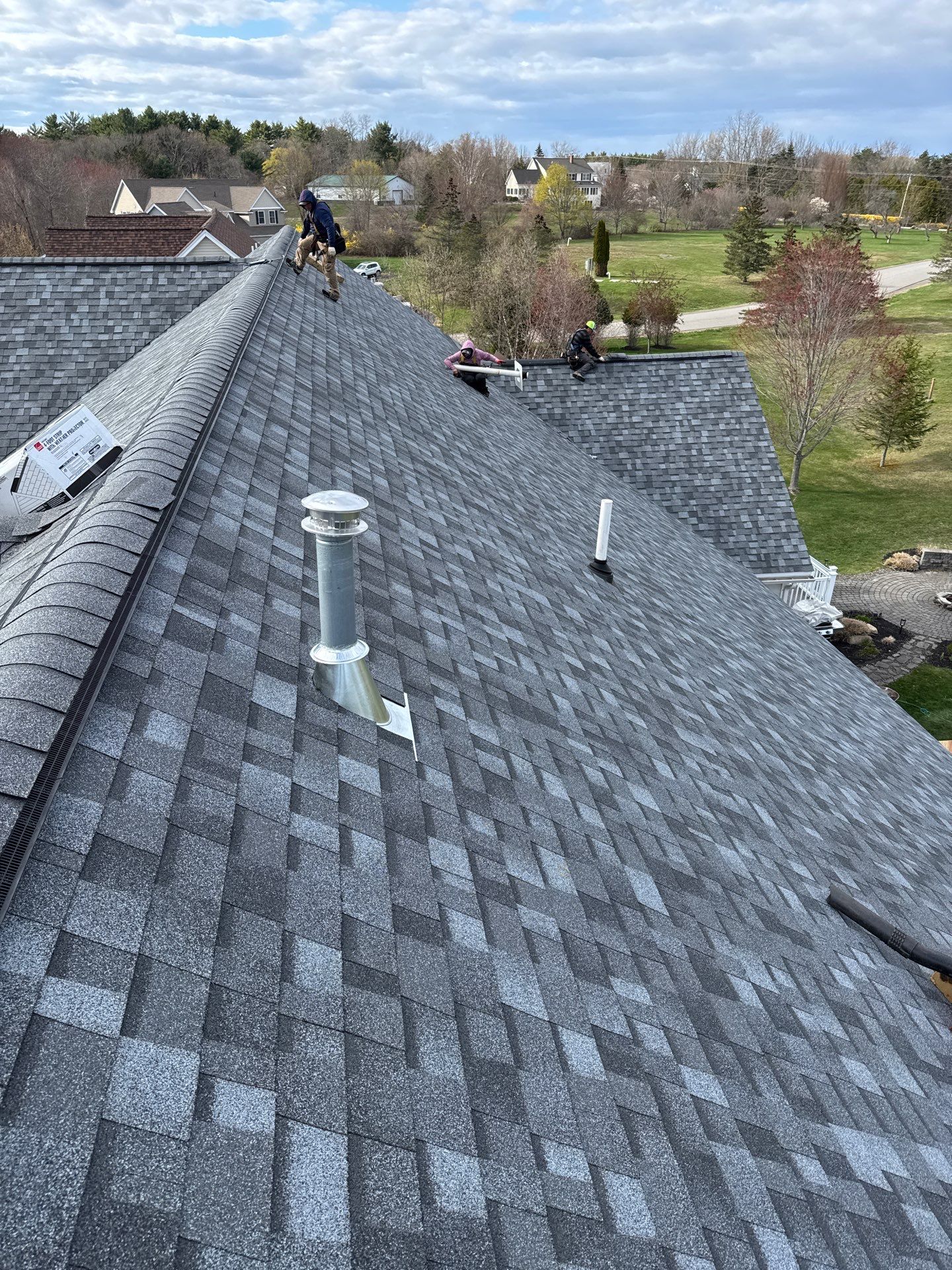 Commercial Roof Replacement in Stratham, NH for Multifamily Townhome Complex by Compass exteriors