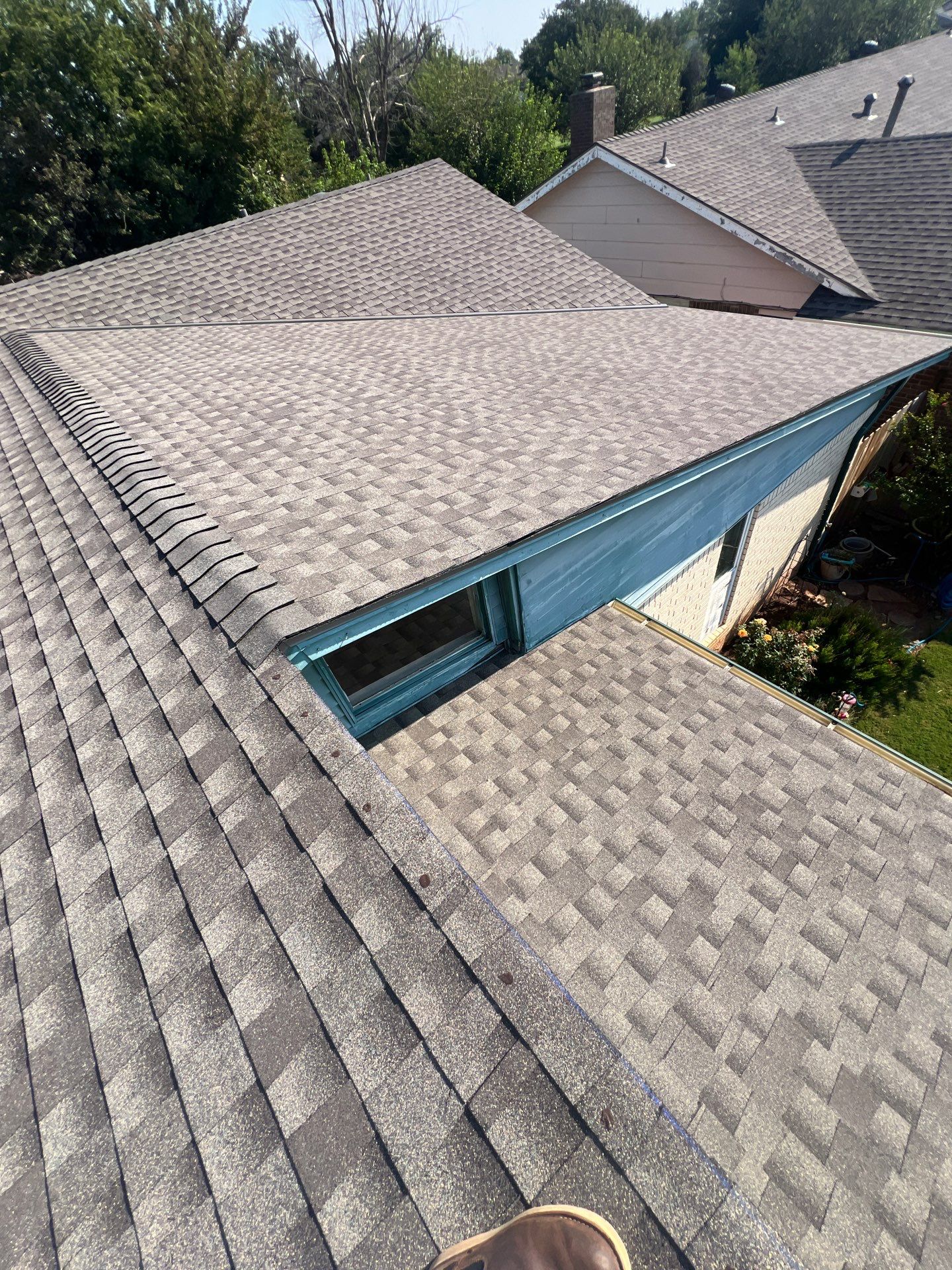Roof Replacement and Gutter Installation in Oklahoma City, OK by McCann's Roofing and Construction
