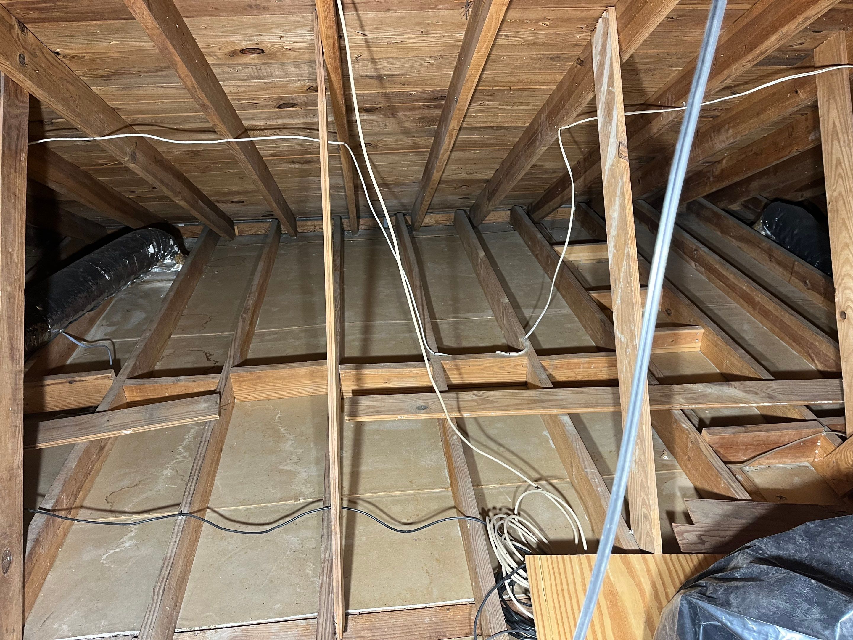 Abatement level clean of non-ACM vermiculite insulation by EAS Environmental, LLC.