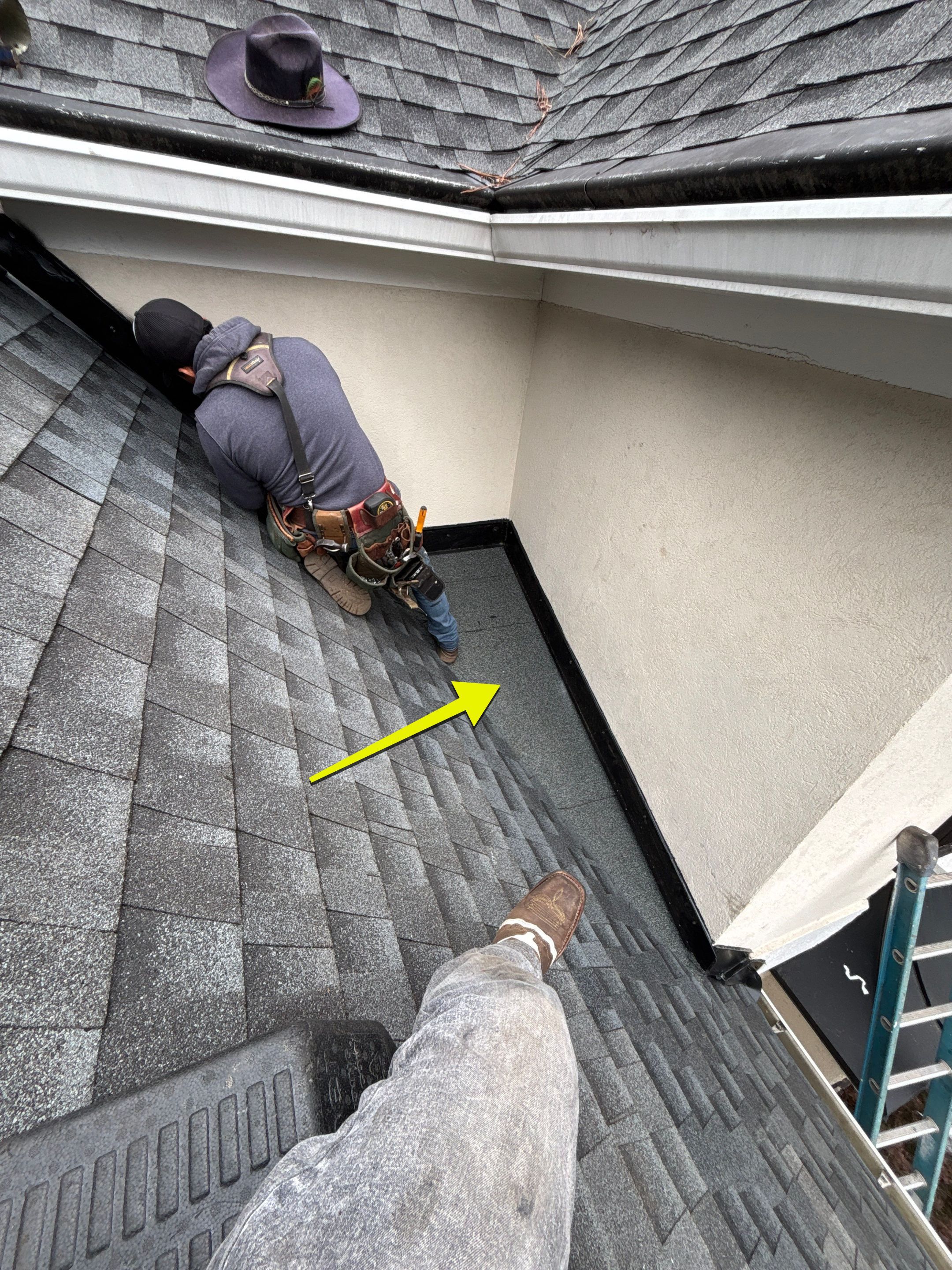 Wrong V valley section installed  by Deerfield Roofing LLC