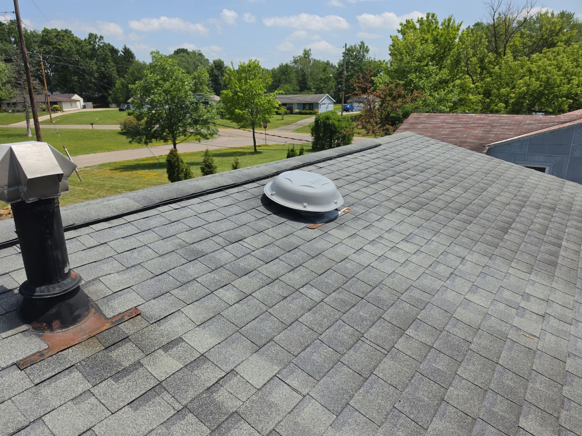 Richard S: Residential Roof Replacement and White Vinyl Siding Installation in Streetsboro by Eagle Eye Roofing
