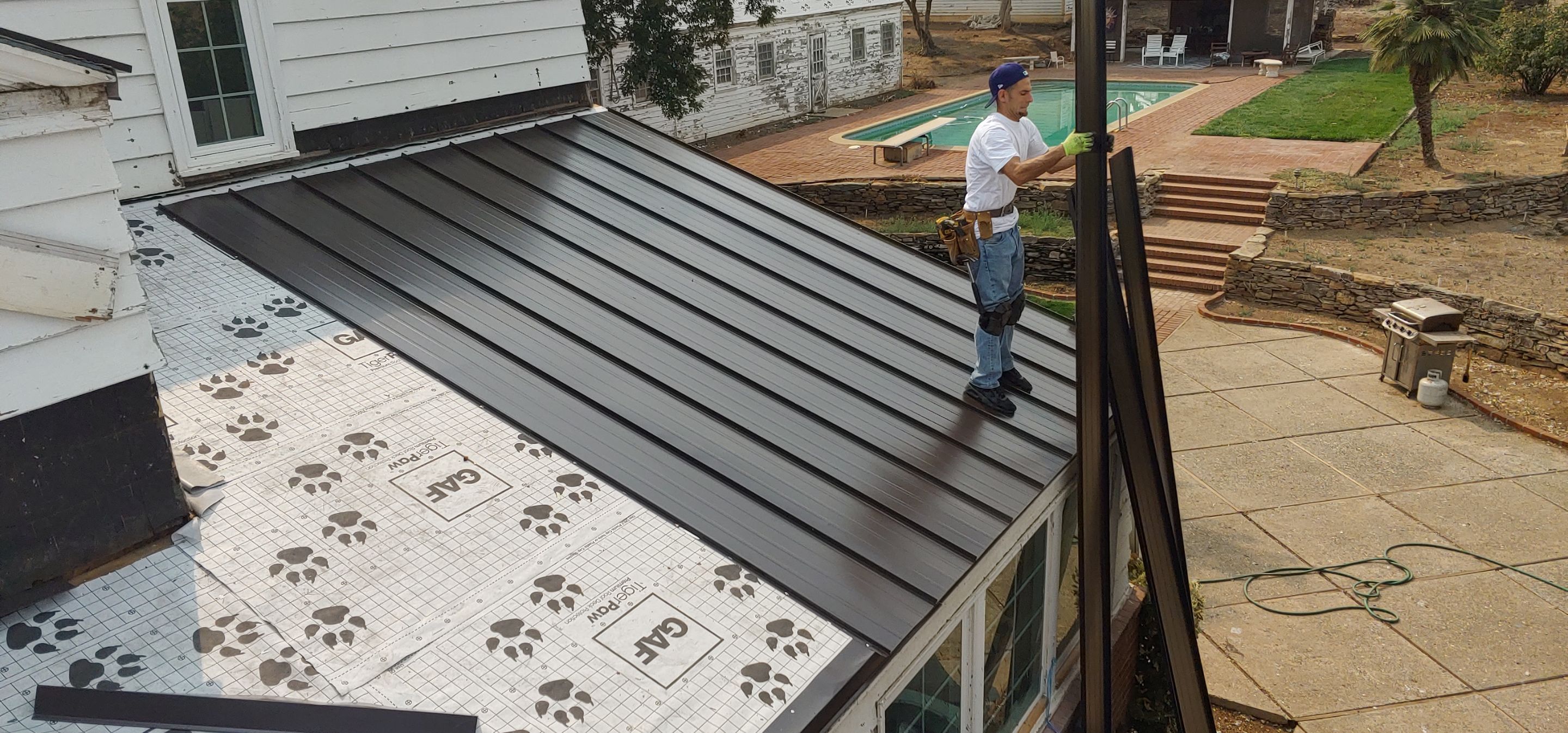 Residential Roofing Installation using Standing seam metal roofing system by Straight Edge Roofing Inc
