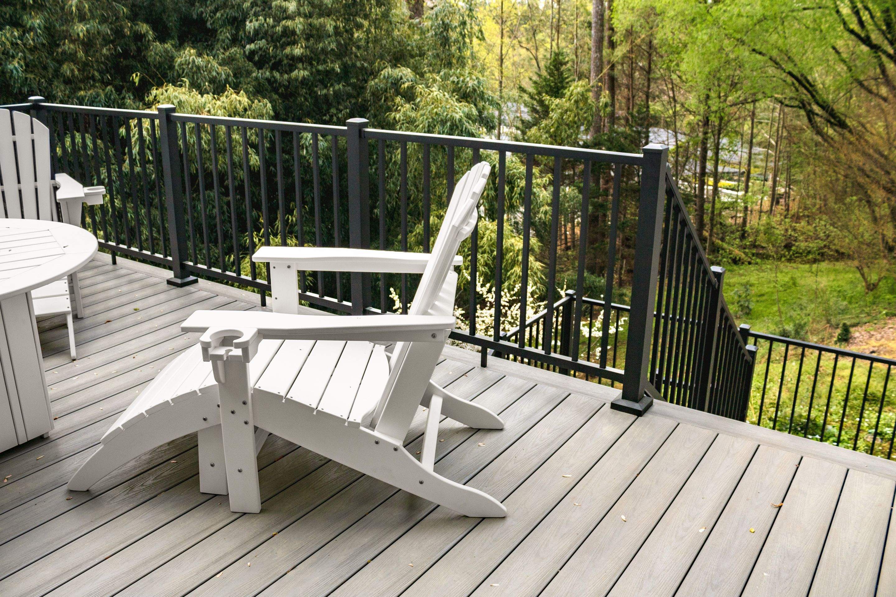 Covered Porch and Deck Build using Deckorators Venture Series Decking and Trex Select Aluminum Railing by Nelson Exteriors