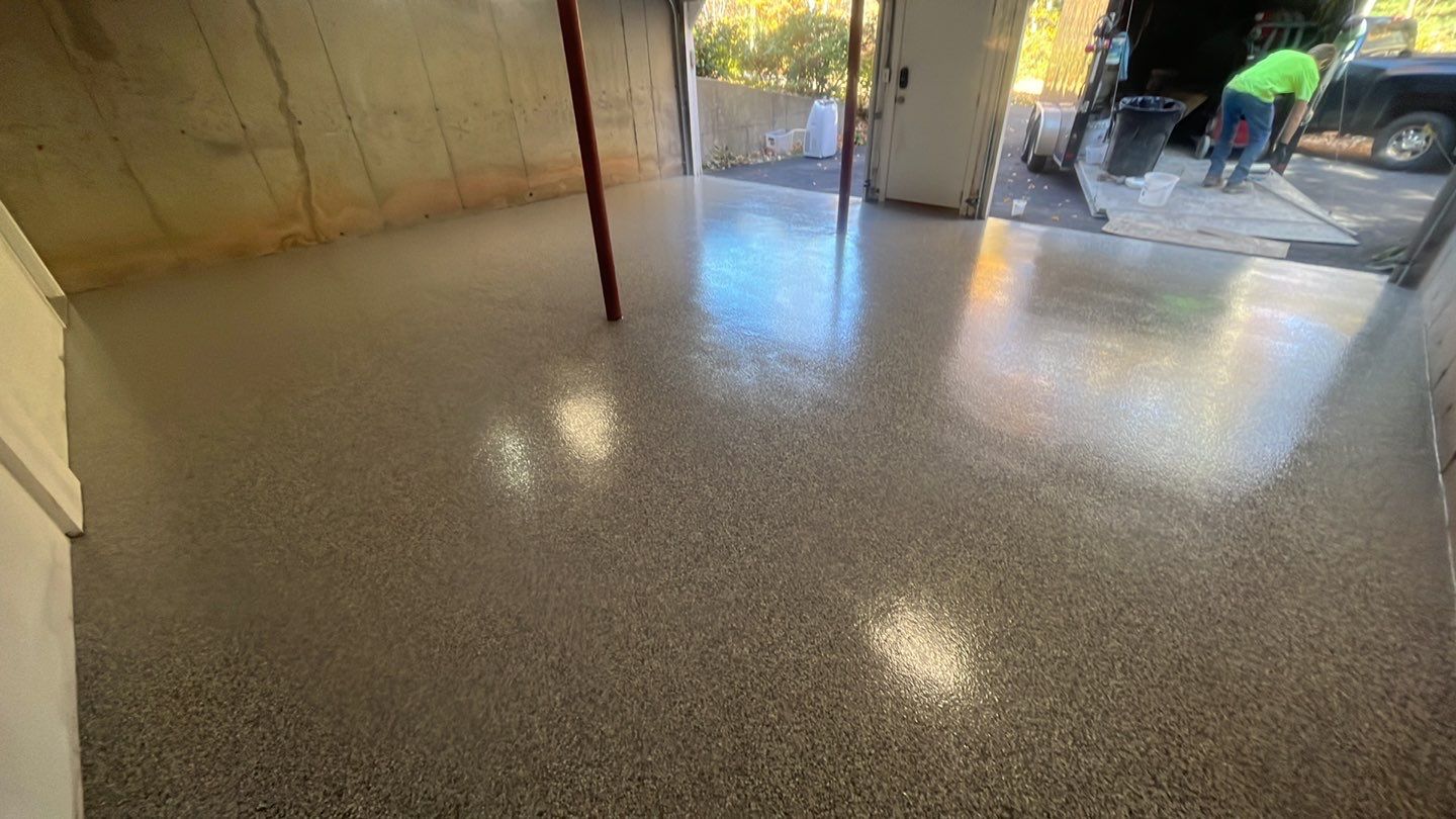 Garage in Londonderry, NH 03053 by Symphony Concrete Coatings