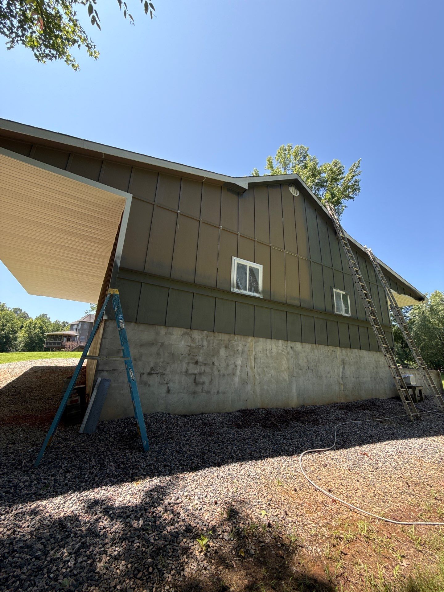 Siding replacement, exterior painting, and front door staining. by GonzalezPainters & Contractors Inc