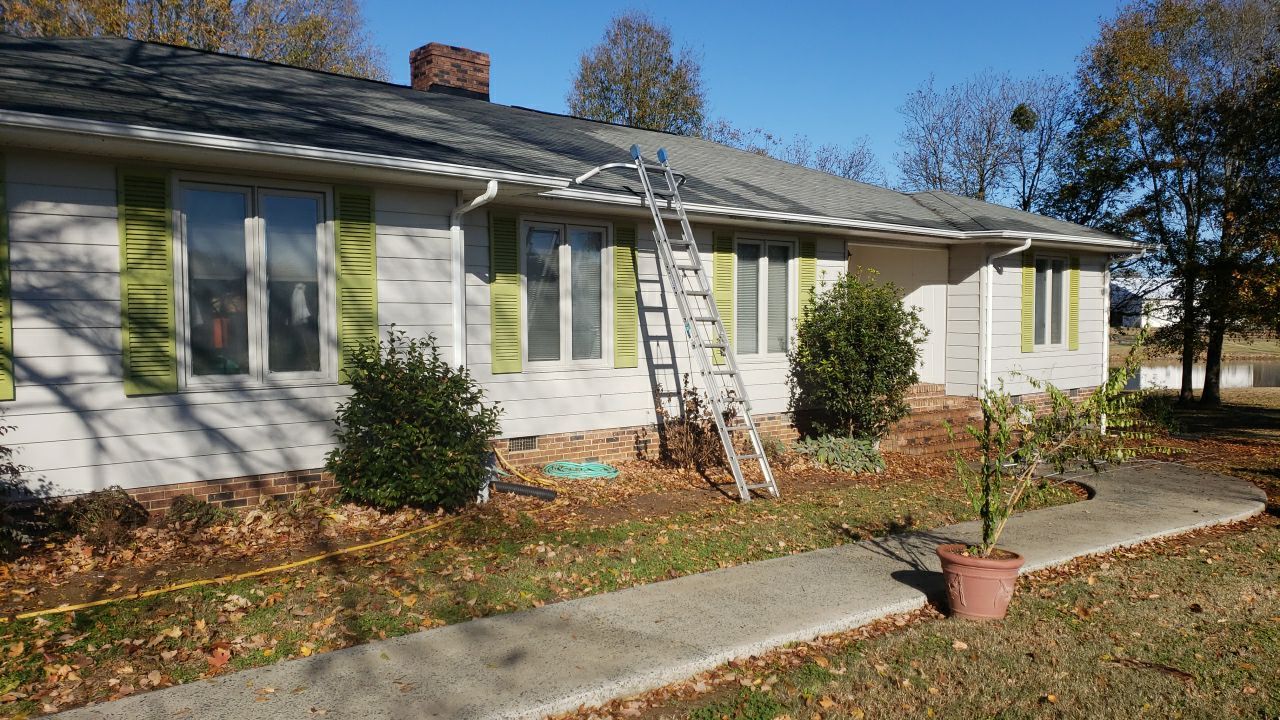 gutter cleaning and house wash and gutter guard installation by Power Wash Masters LLC