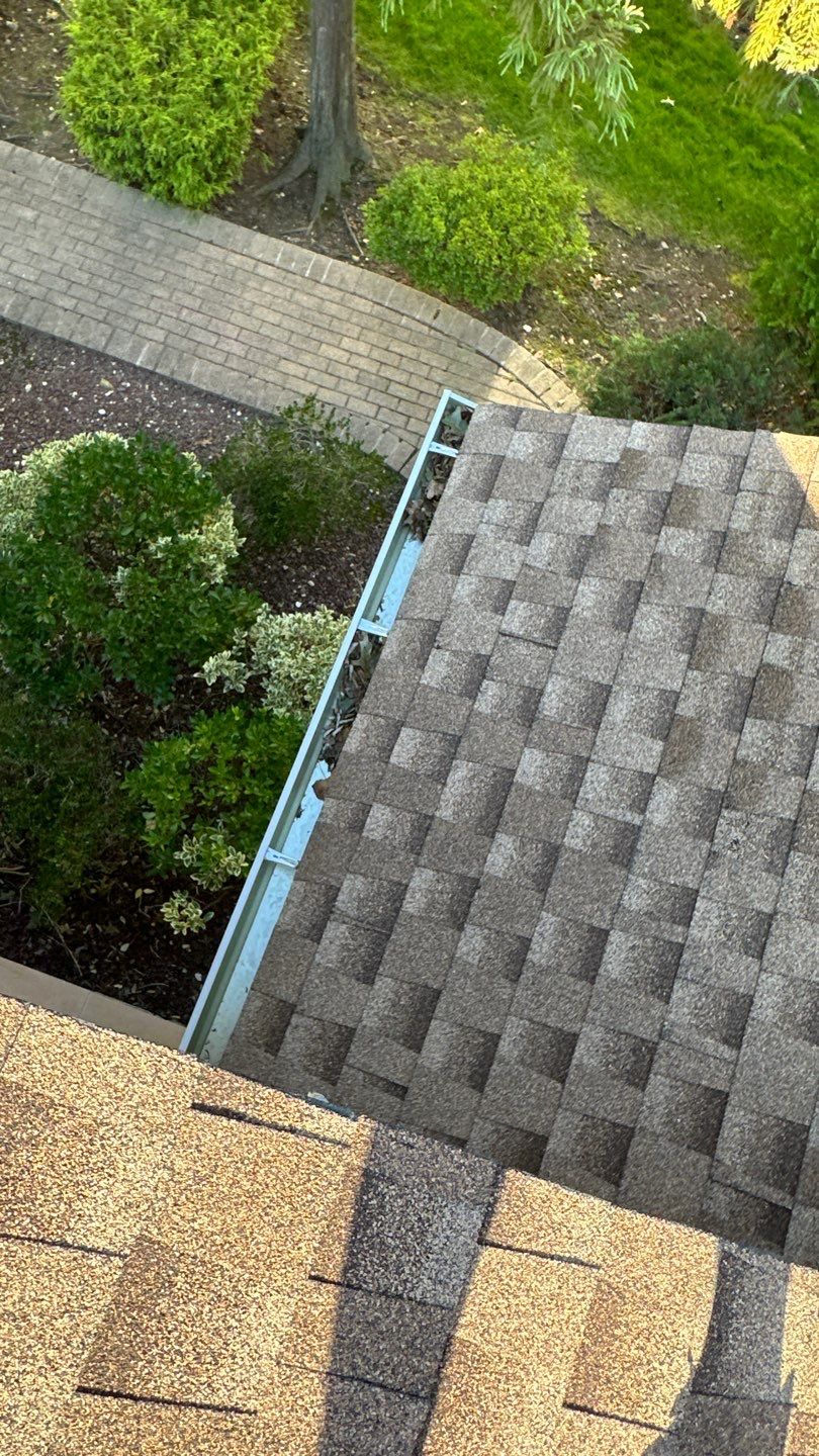 Roslyn Gutter Cleaning and Microguard Gutter Shield Installation by Above All Gutters 