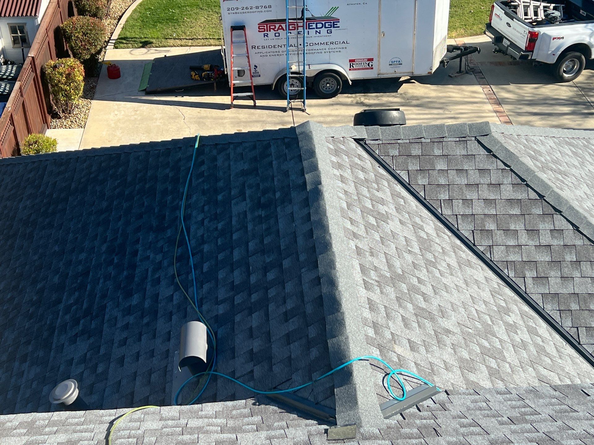 New shingles and gutters using GAF Timberline HDZ shingles and aluminum gutter by Straight Edge Roofing Inc