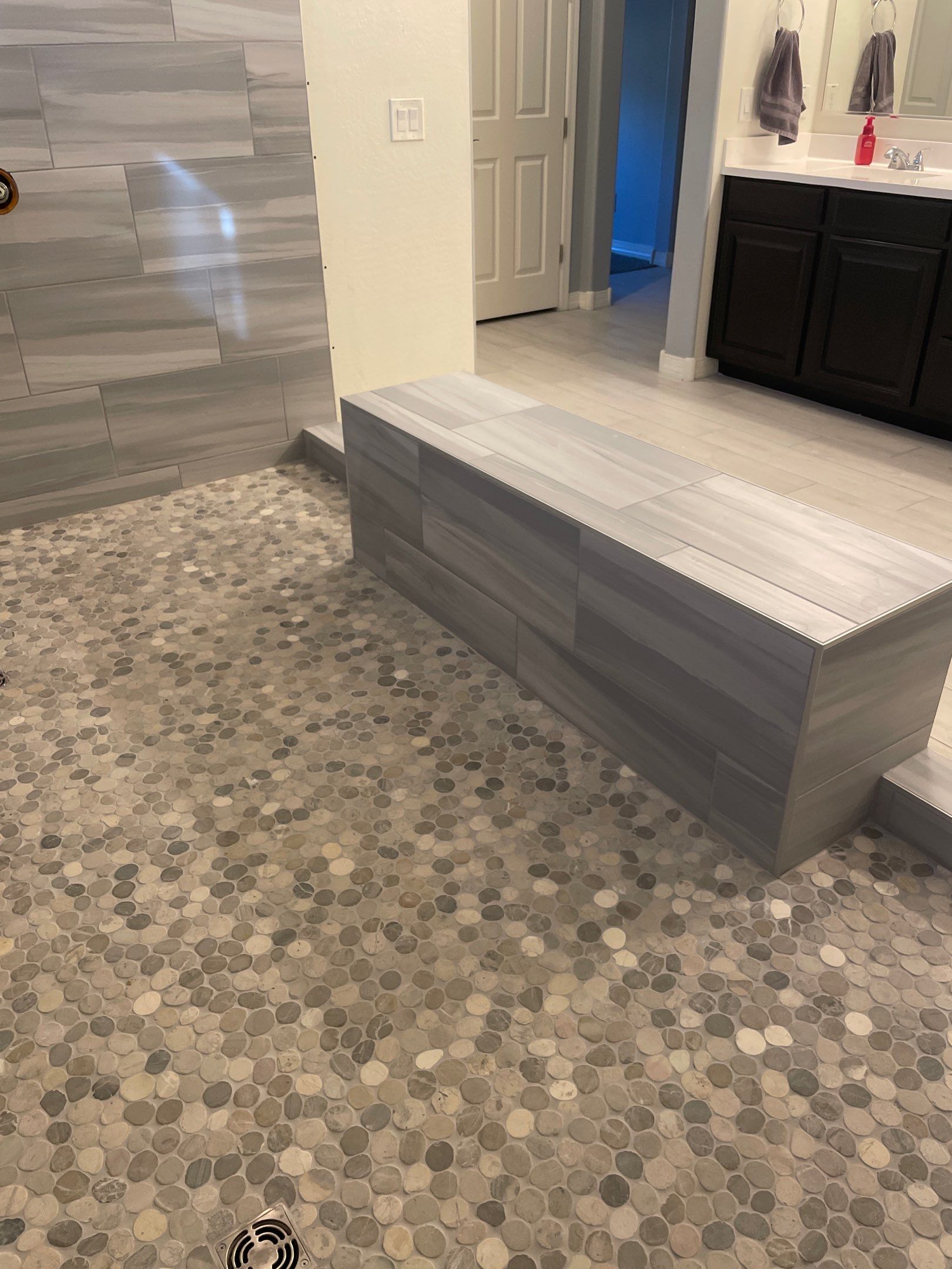 Wood Look Tile Floors and an Extra Large Shower  by Footprints Floors of Chandler 