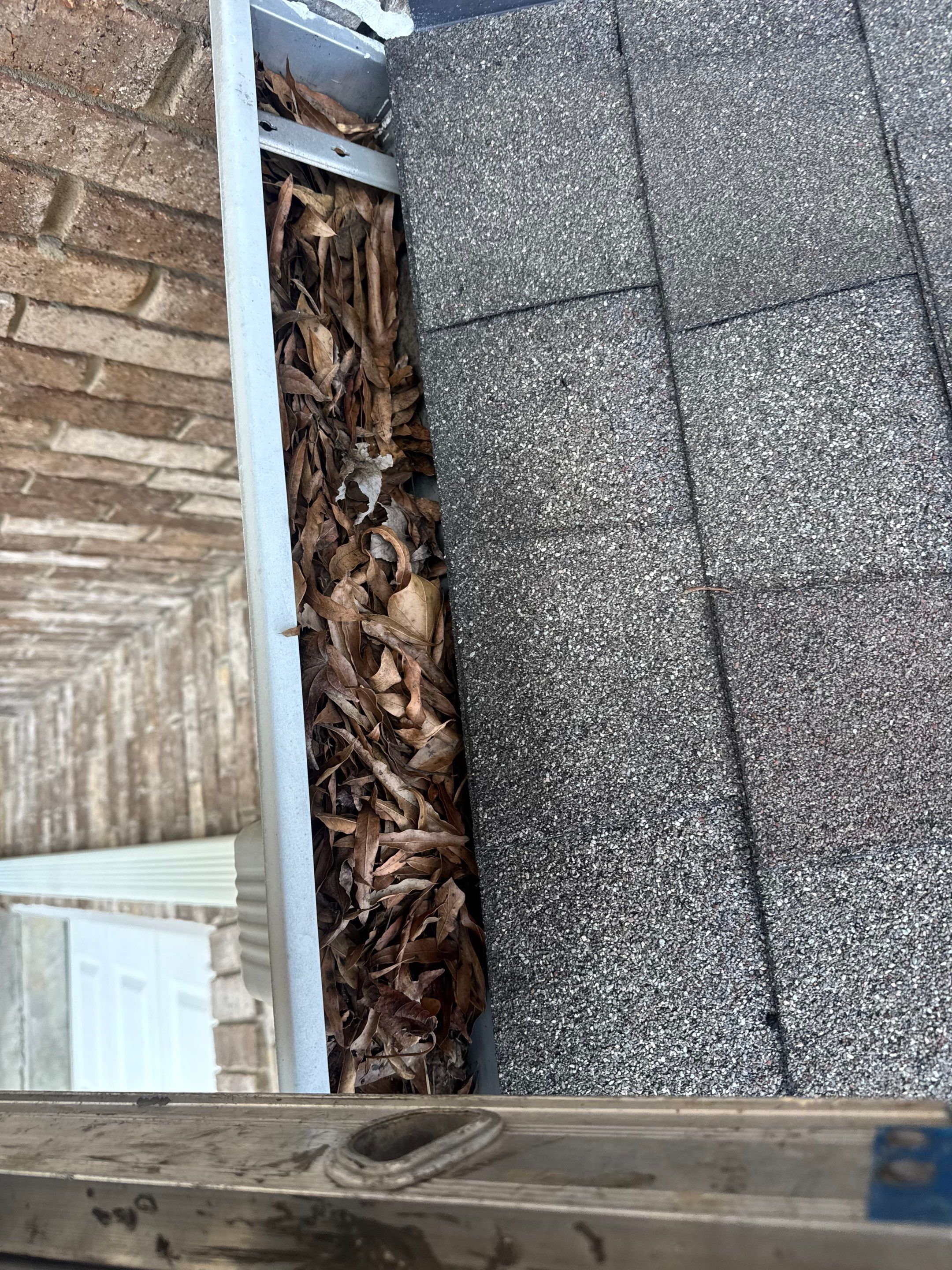 Gutter Repair and Downspout Installation in Chelsea by The Roofing Dudes