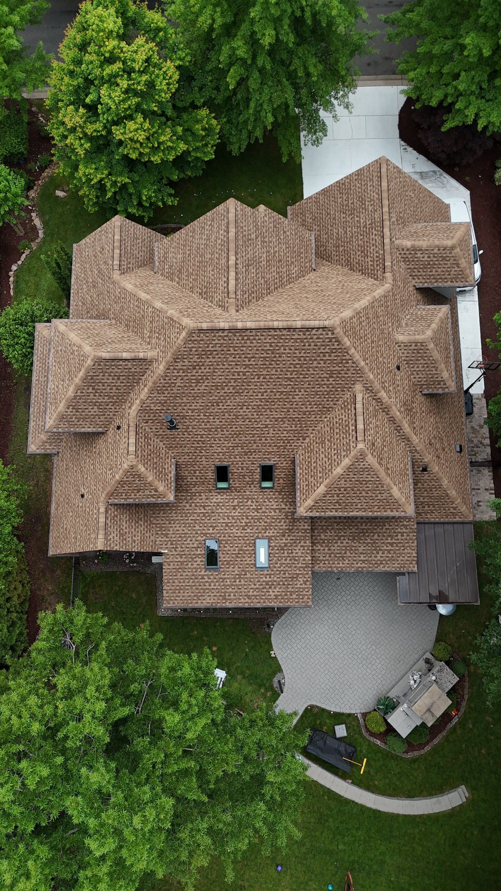 Roof Replacement - GAF Timberline HDZ Shakewood - 6” coppertone seamless gutters by Pro Performance Roofing