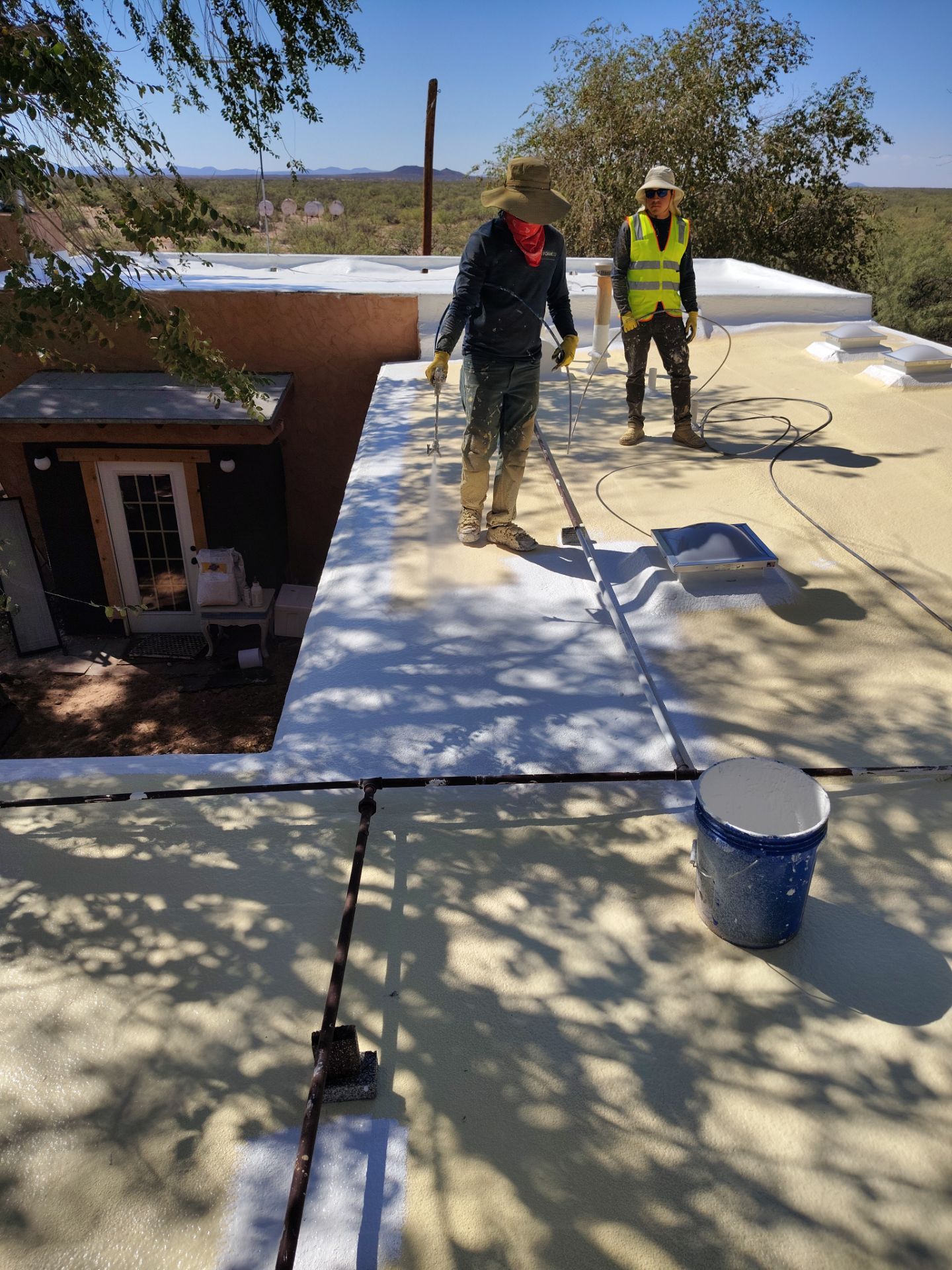 Residential roof application by SPF Services 