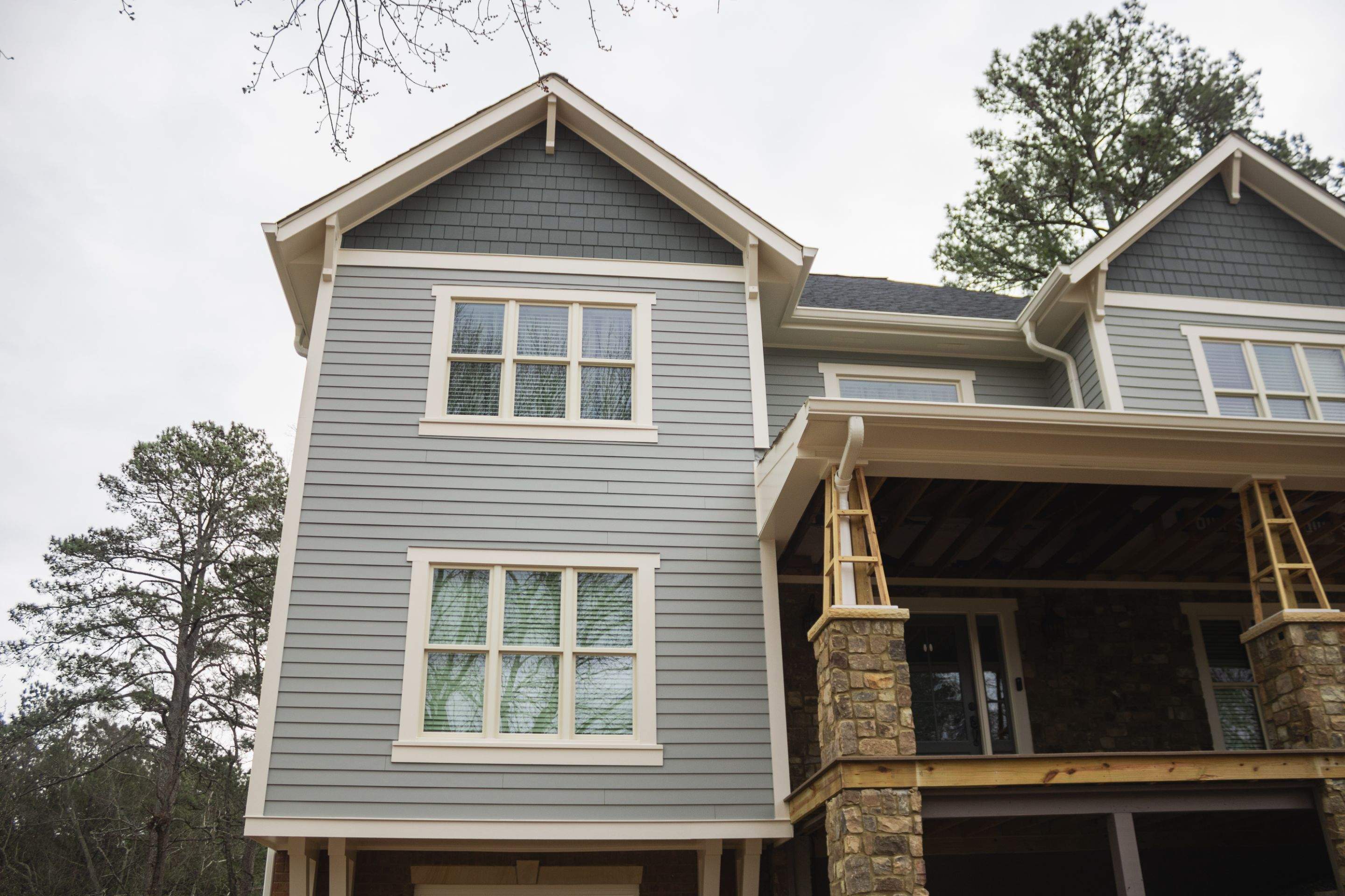 James Hardie Siding Replacement, Exterior Painting, Deck Stain, and Gutter Installation in Peachtree Corners, GA by Nelson Exteriors