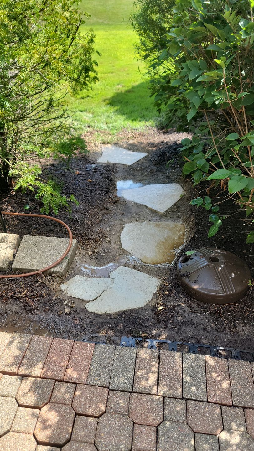 Brick paver repair, clean and seal by Northern Power Washing LLC.