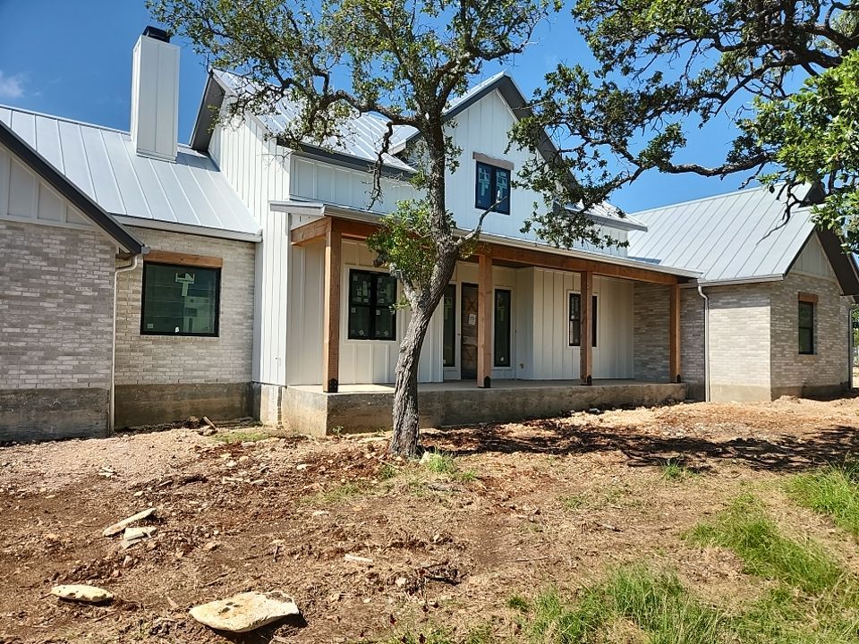 Residential Rainwater Collection System - Pioneer 40K gallon water tank in Mangrove Green by Hill Country Rain Water