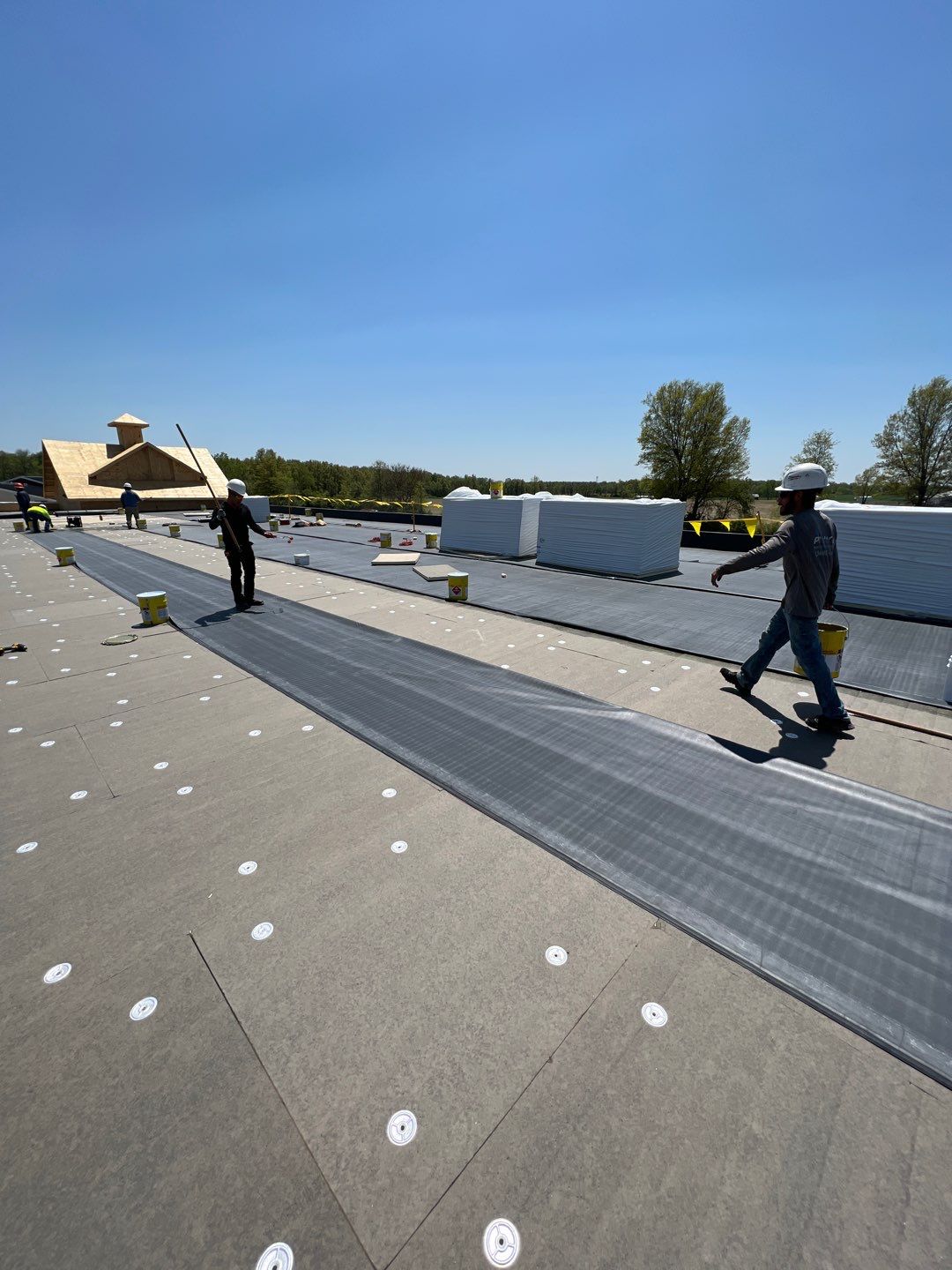 Commercial Roofing Installation using 60 mil rubber roof  by Nitro Roofing and Construction