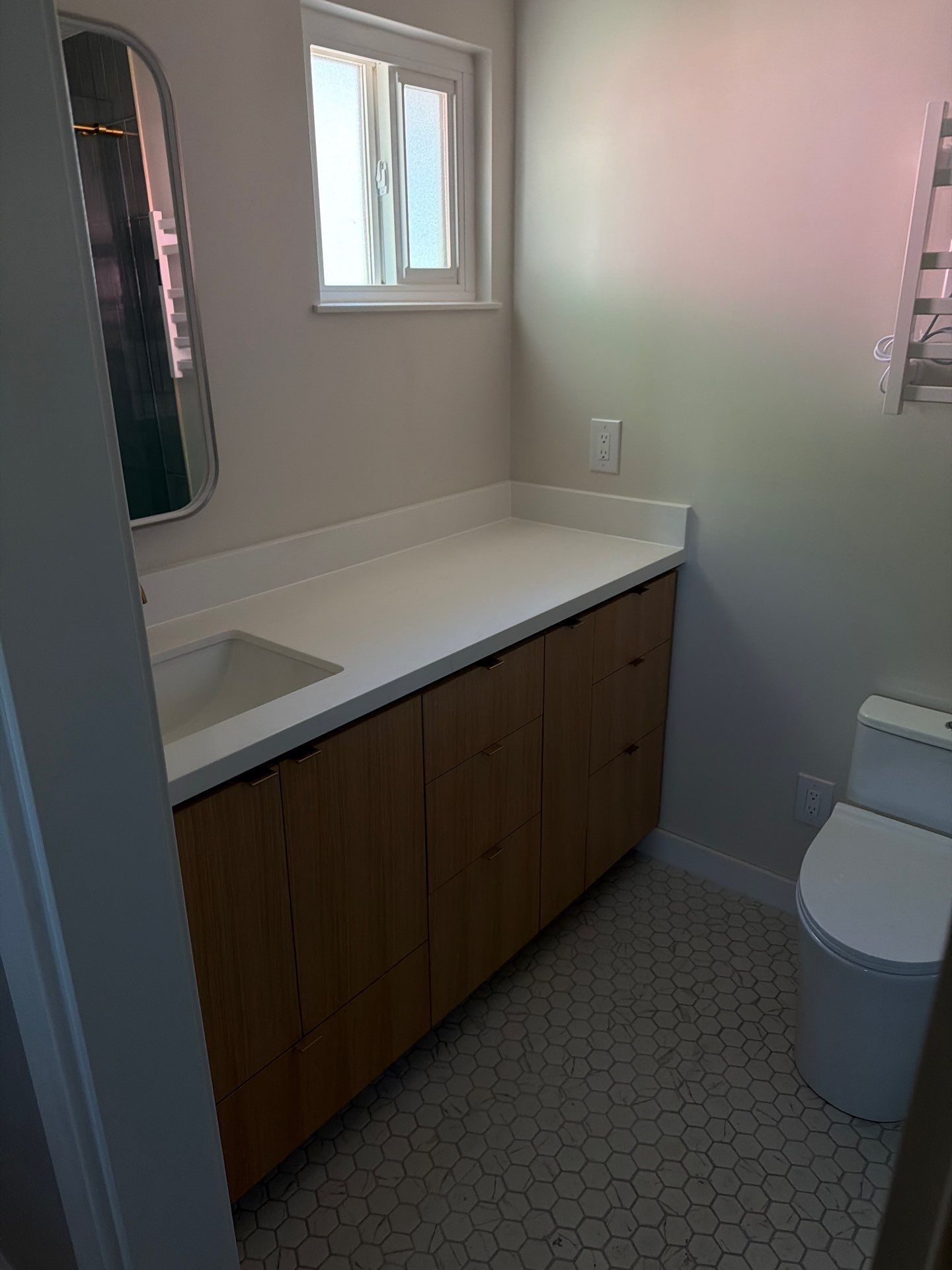 Custom Bathroom Remodel with Heated Floors and Vertical Sage Tile by  H4H Remodeling and Repairs Inc.