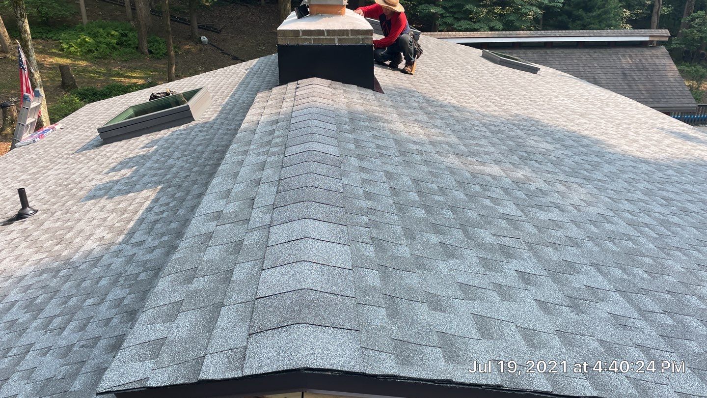Deckhouse Roof Replacement by American Home Contractors