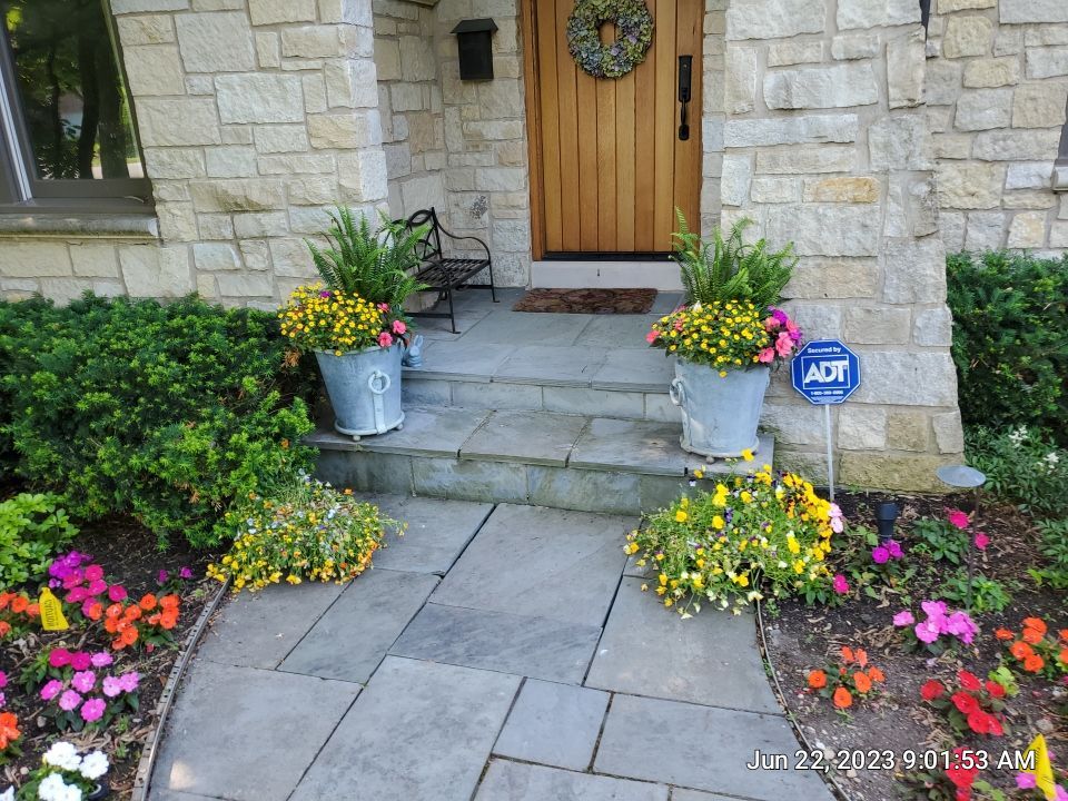 Northbrook, IL stucco home soft wash and stone cleaning by Northern Power Washing LLC.