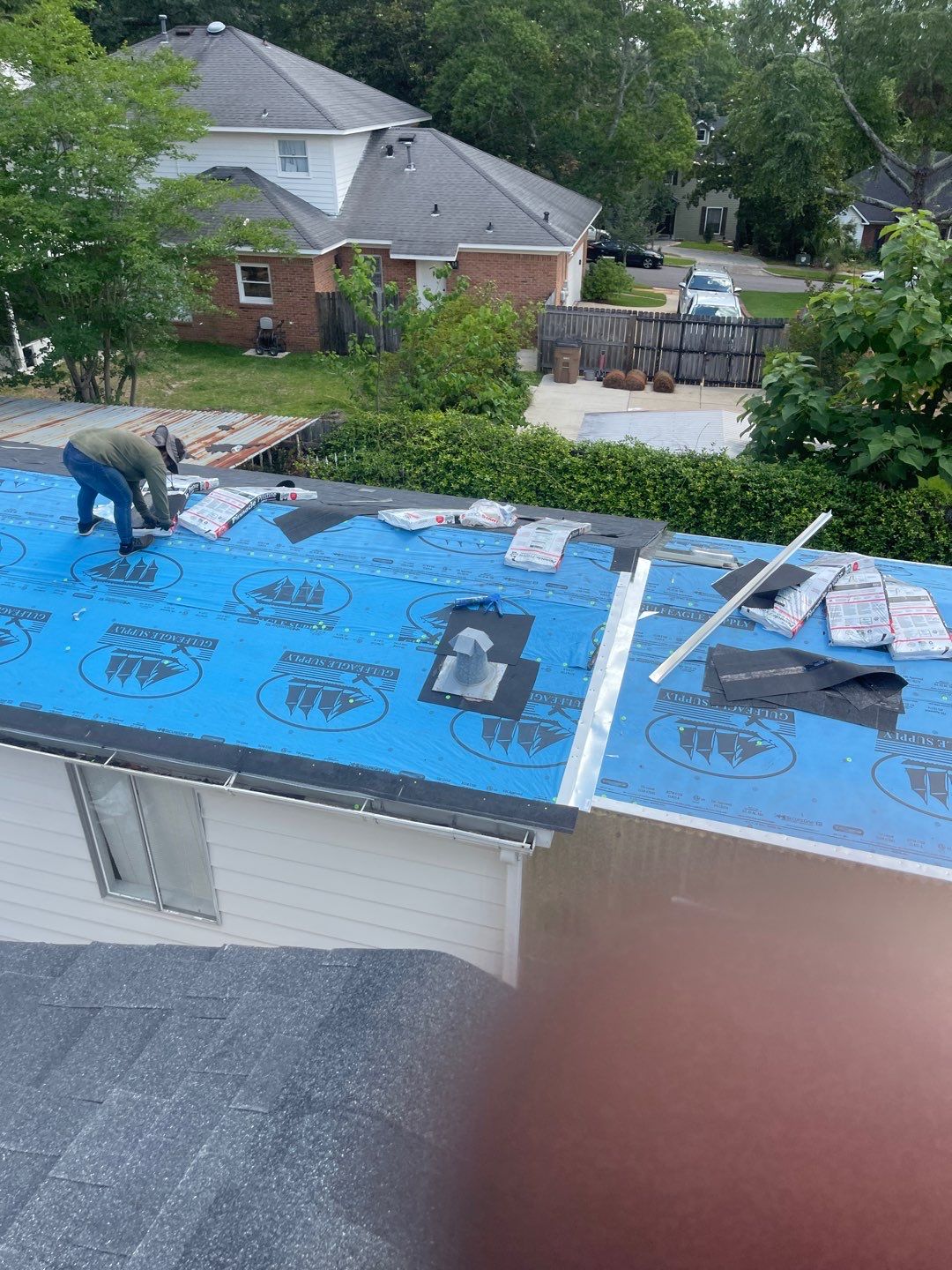 Residential Roofing Installation using Roof Replacement by American Roofing & Construction LLC