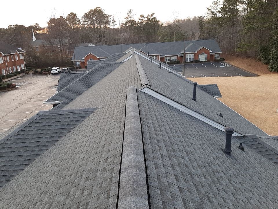 Weekend install for this commercial building to eliminate disruption to the businesses by Georgia Roof Advisors