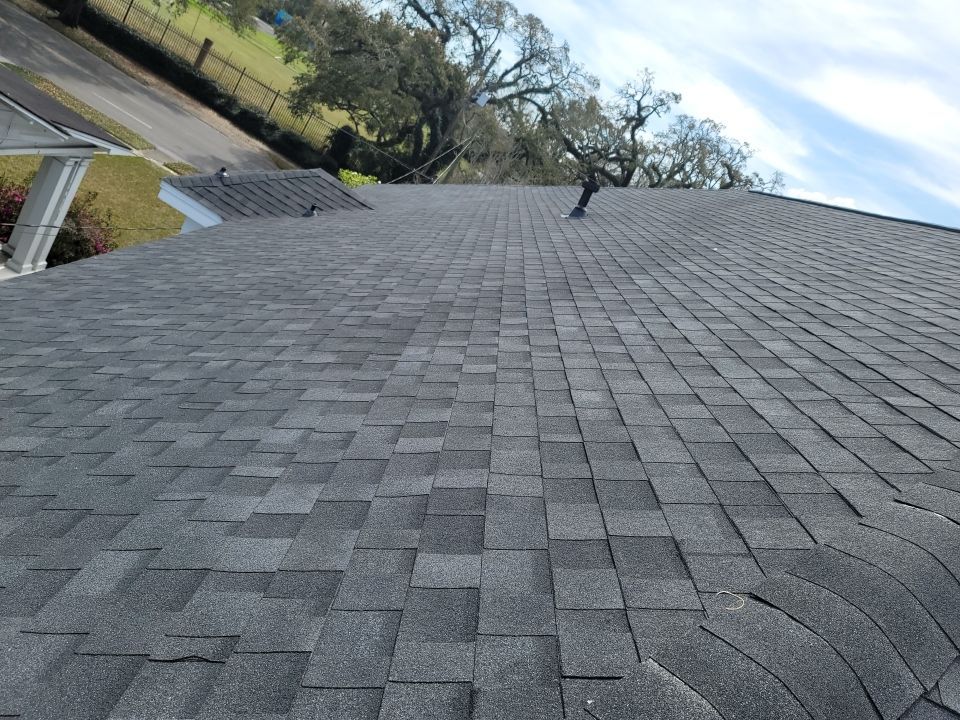 Residential Roofing Installation using Roof Replacement by American Roofing & Construction LLC