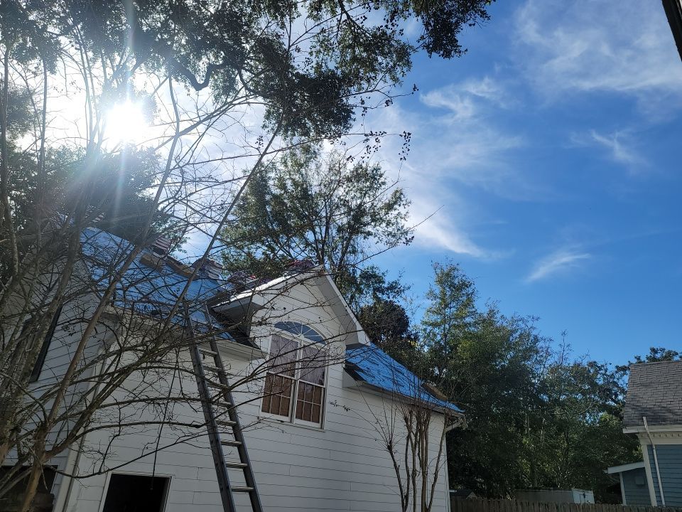 Residential Roofing Installation using Roof Replacement by American Roofing & Construction LLC