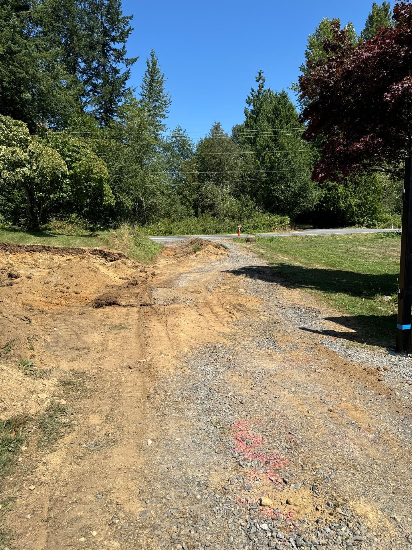 Joann | Asphalt Driveway & Retaining Wall  by Jireh Asphalt & Concrete Inc 