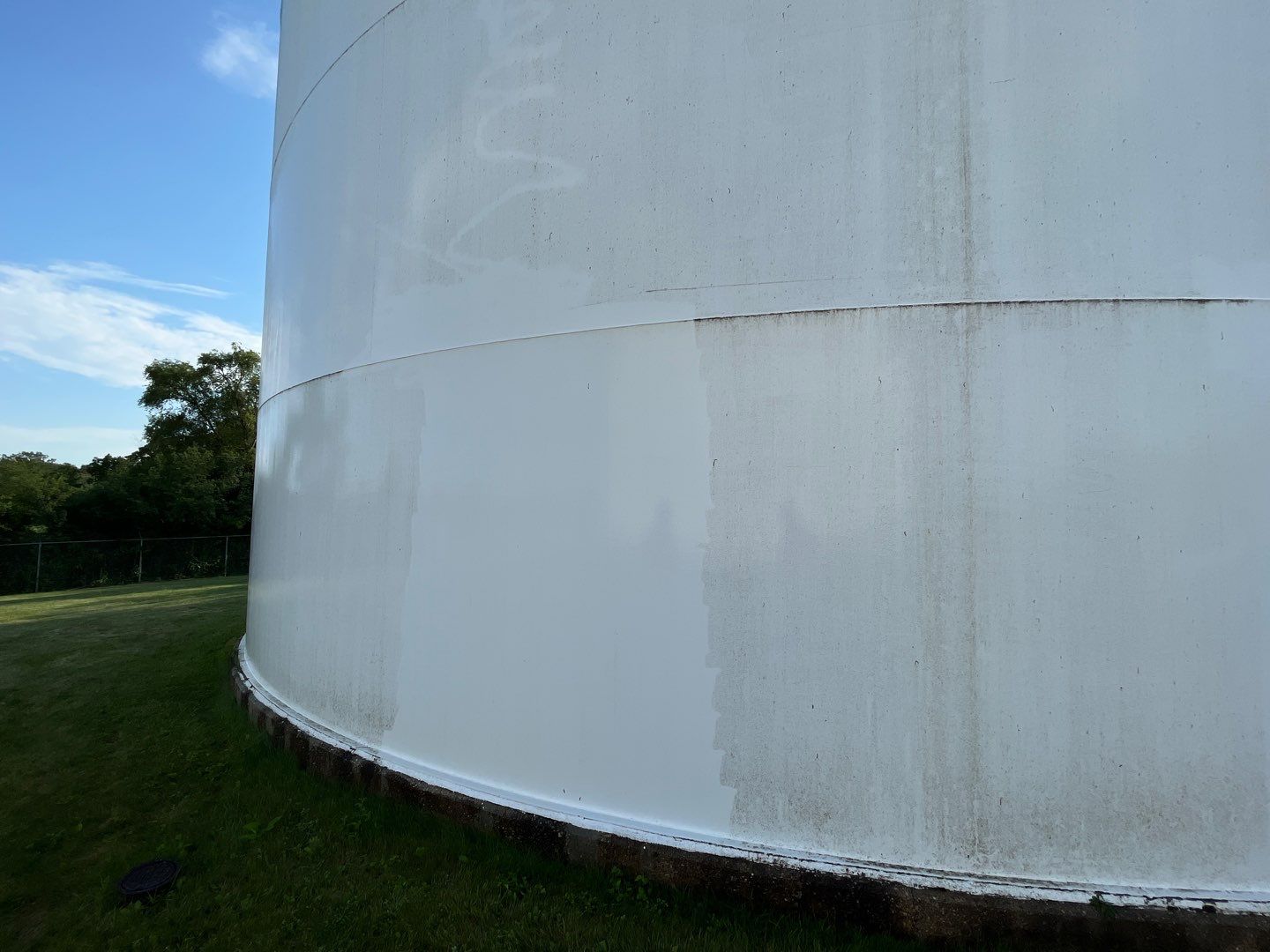 Water tank cleaning by Northern Power Washing LLC.