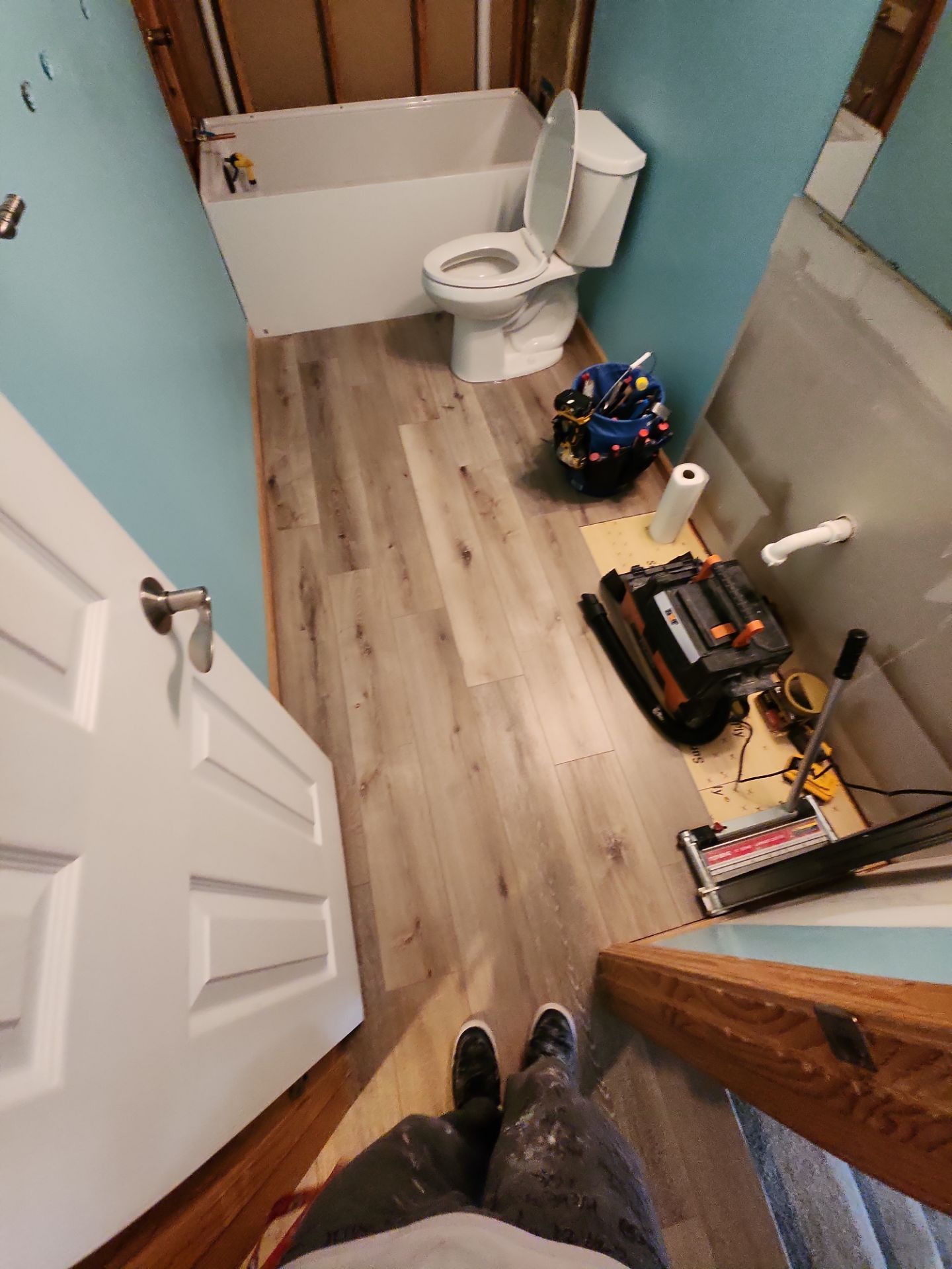 Bathroom Remodel using Luxury Vinyl Plank by The Shower Company